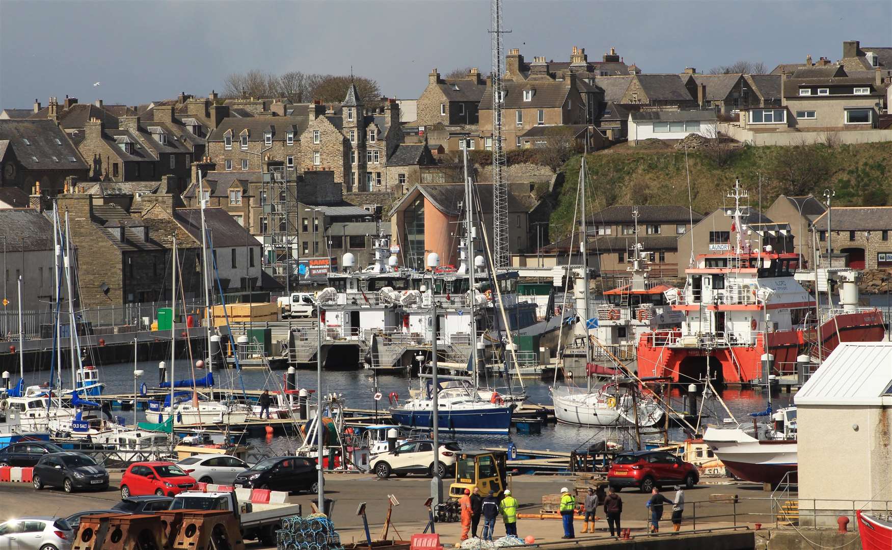 A busy scene at Wick's inner harbour, looking towards the marina and the Beatrice base. Picture: Alan Hendry