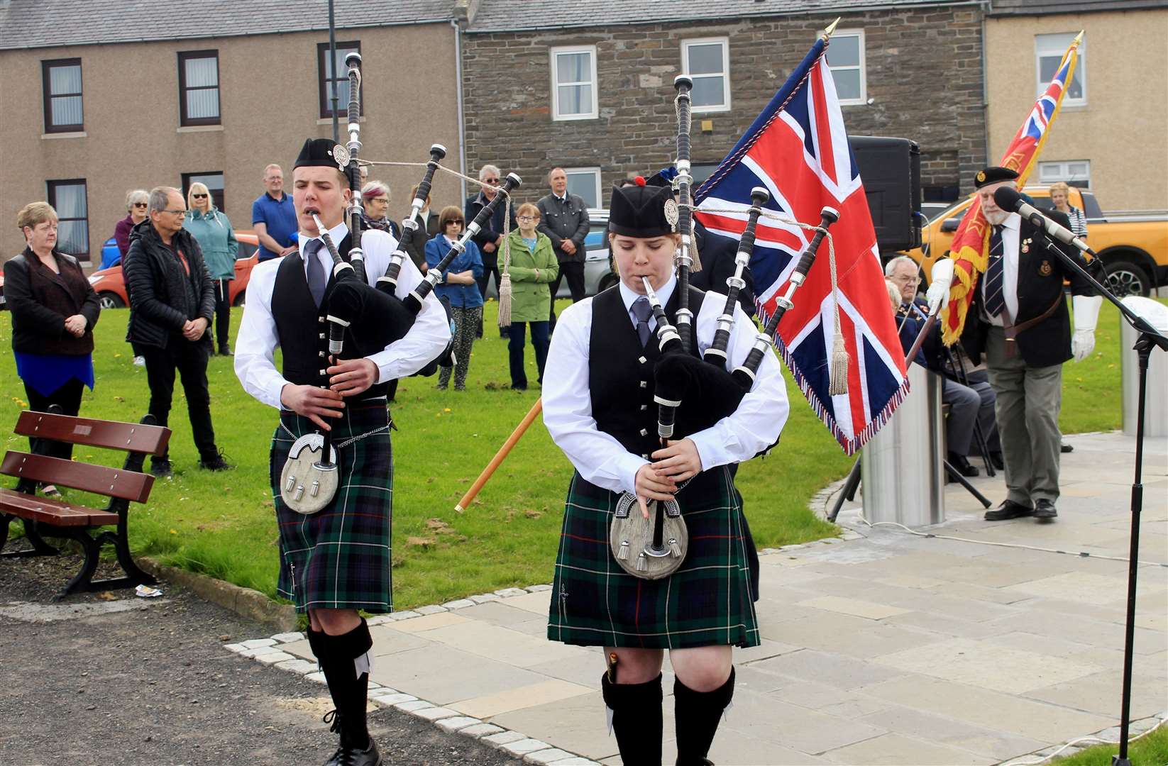Glenn and Morven Miller, of Wick RBLS Pipe Band, leading the colour party away at the end of the ceremony. Picture: Alan Hendry