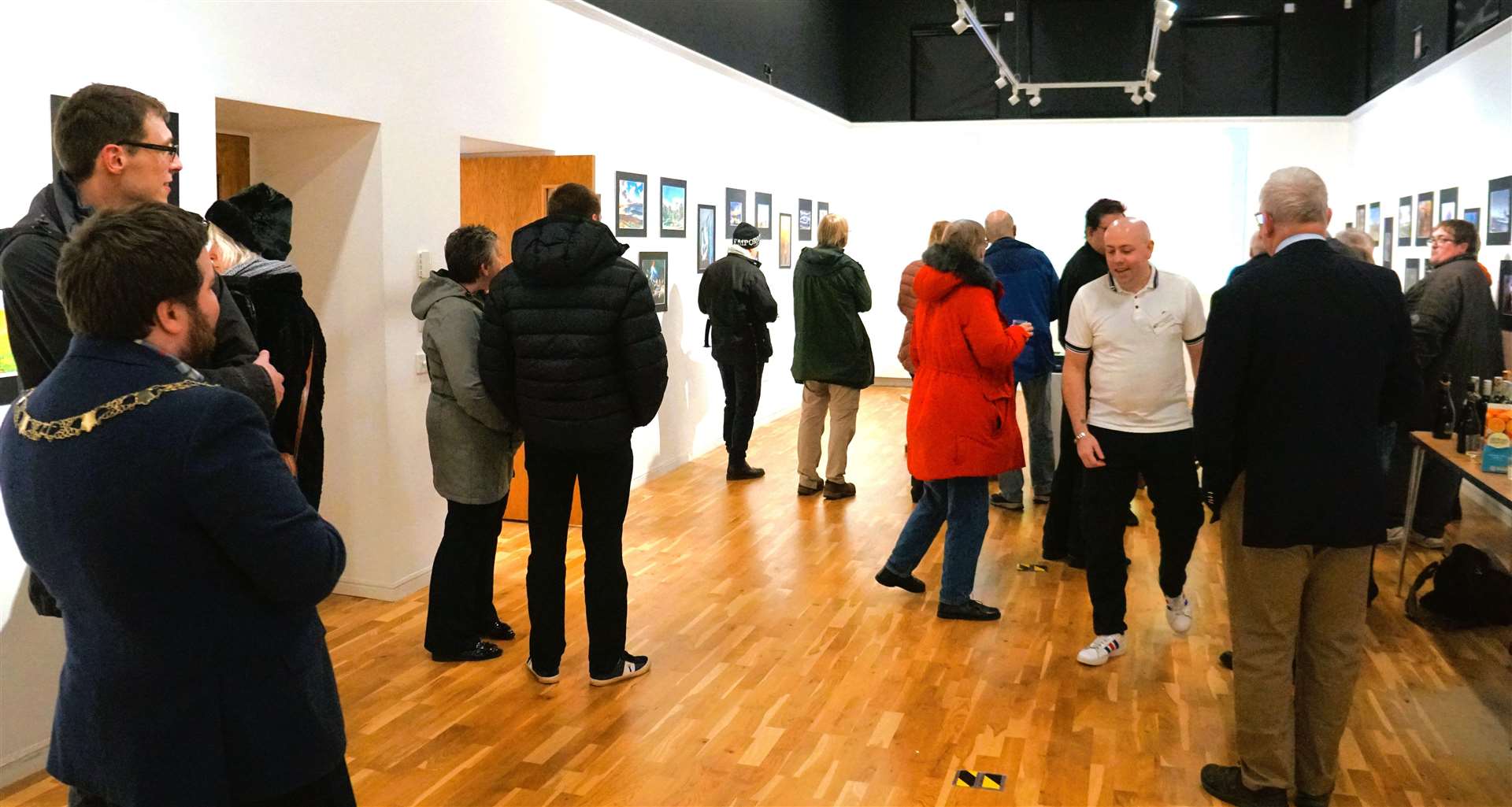 There was a fair buzz around the art gallery for the opening of the Thurso Camera Club show. Picture: DGS