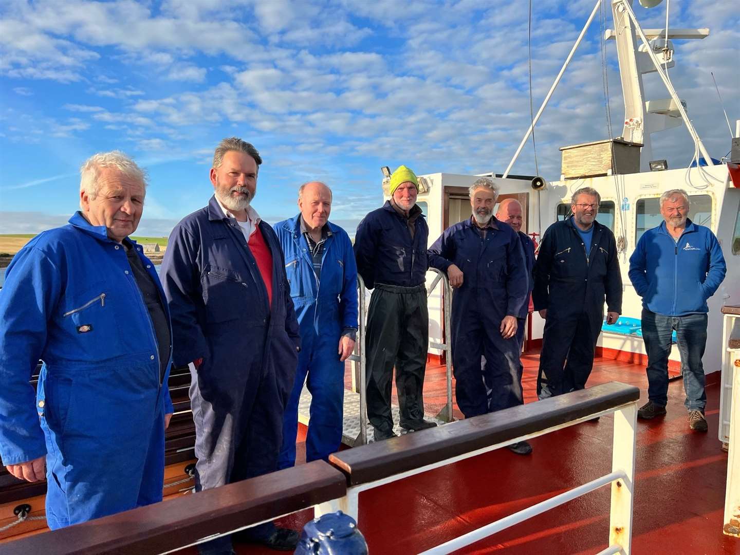 Some of the staff of John O'Groats Ferries at the old pier in Burwick on Thursday on the Pentland Venture's last sailing of the season. Picture: Fred Fermor