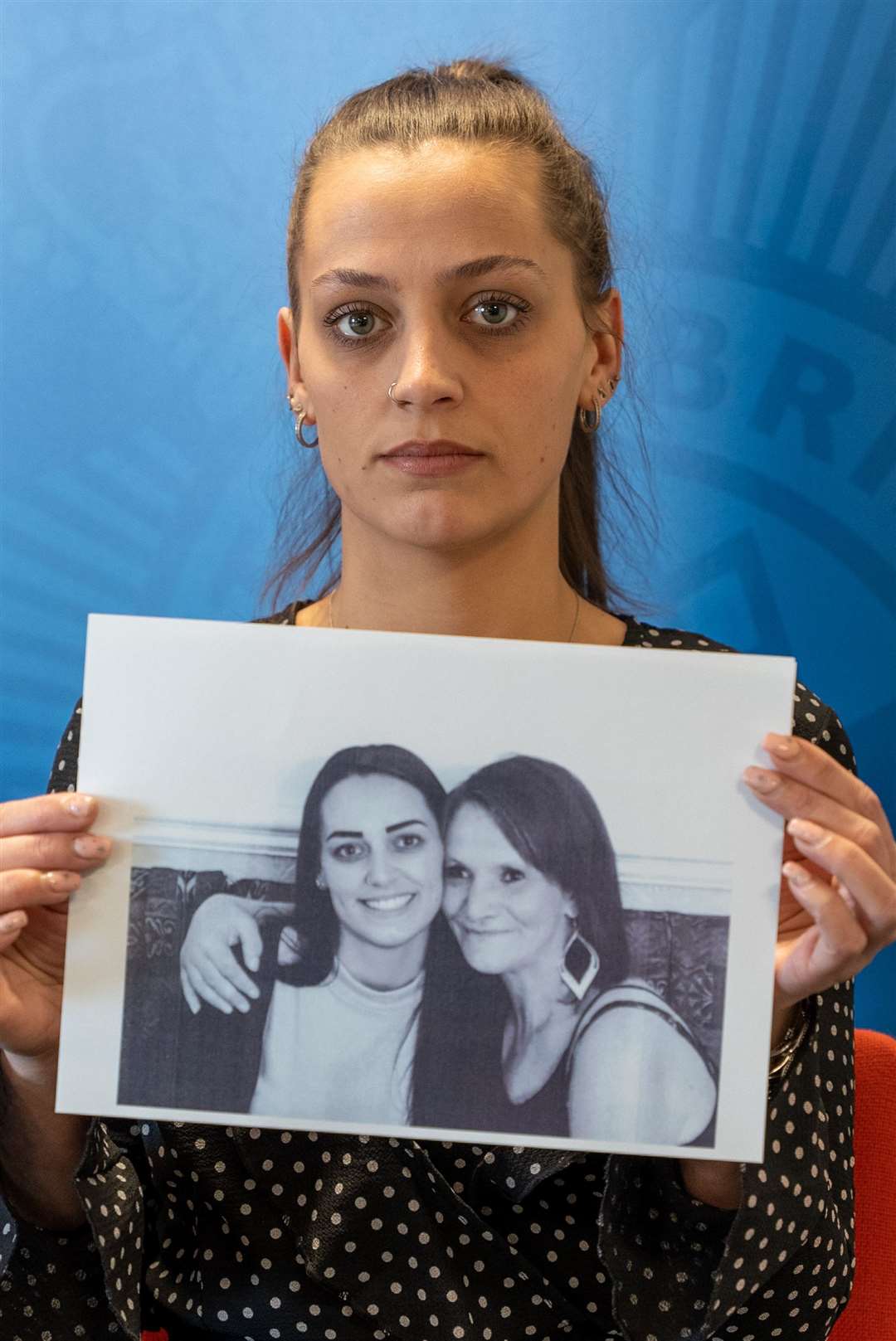 Shannon Brown holding a photograph of herself with her mother, right, Michelle Hanson (Northumbria Police/PA)