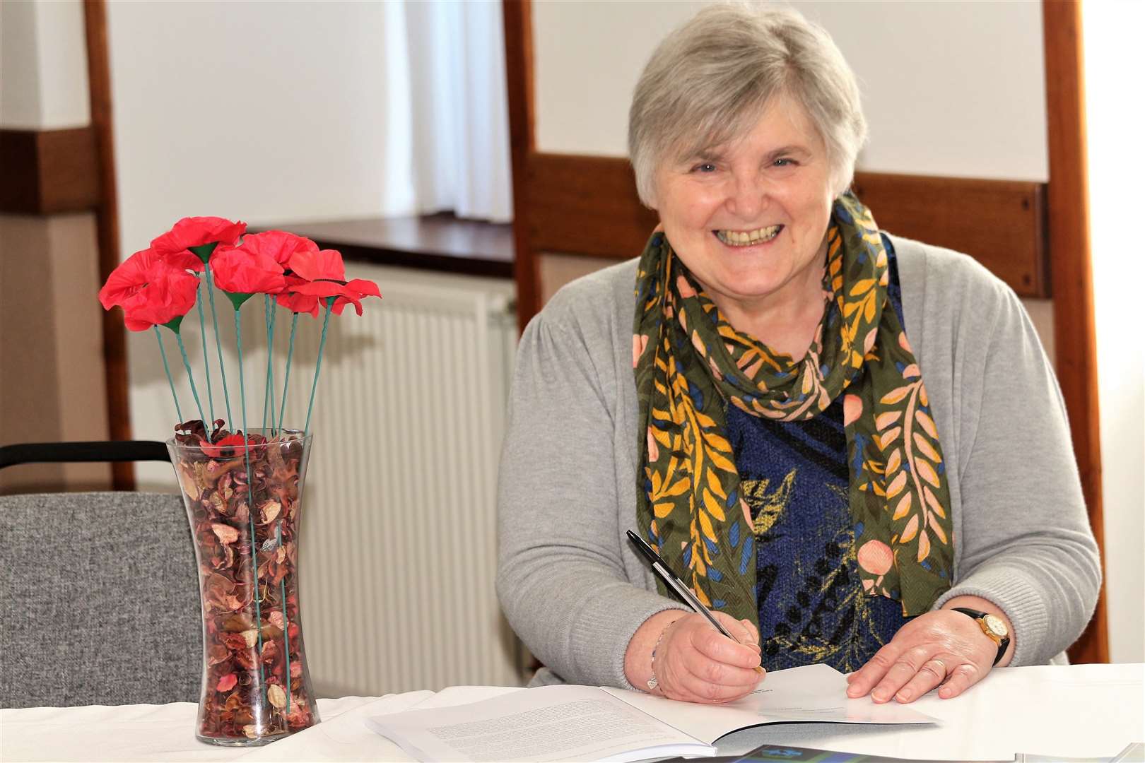 Kathy signs copies of The Unreturning Brave. Picture: Eswyl Fell