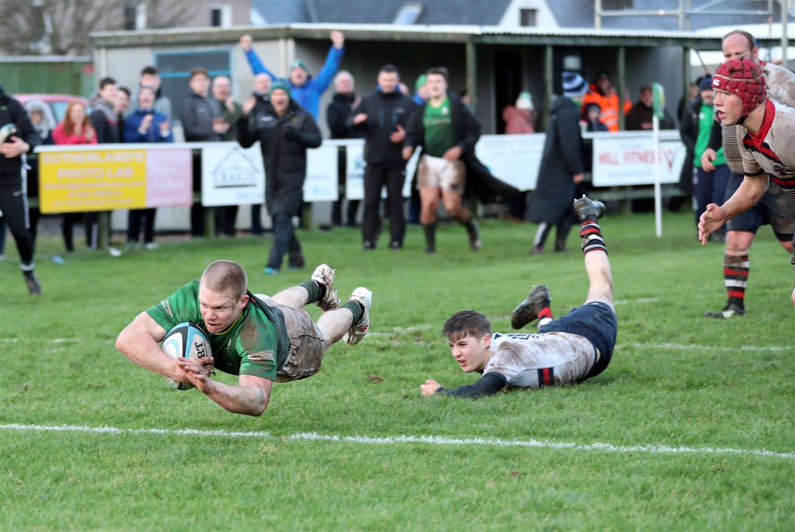 Kris Hamilton dives over the try-line to score for Caithness against Murrayfield Wanderers. Picture: James Gunn