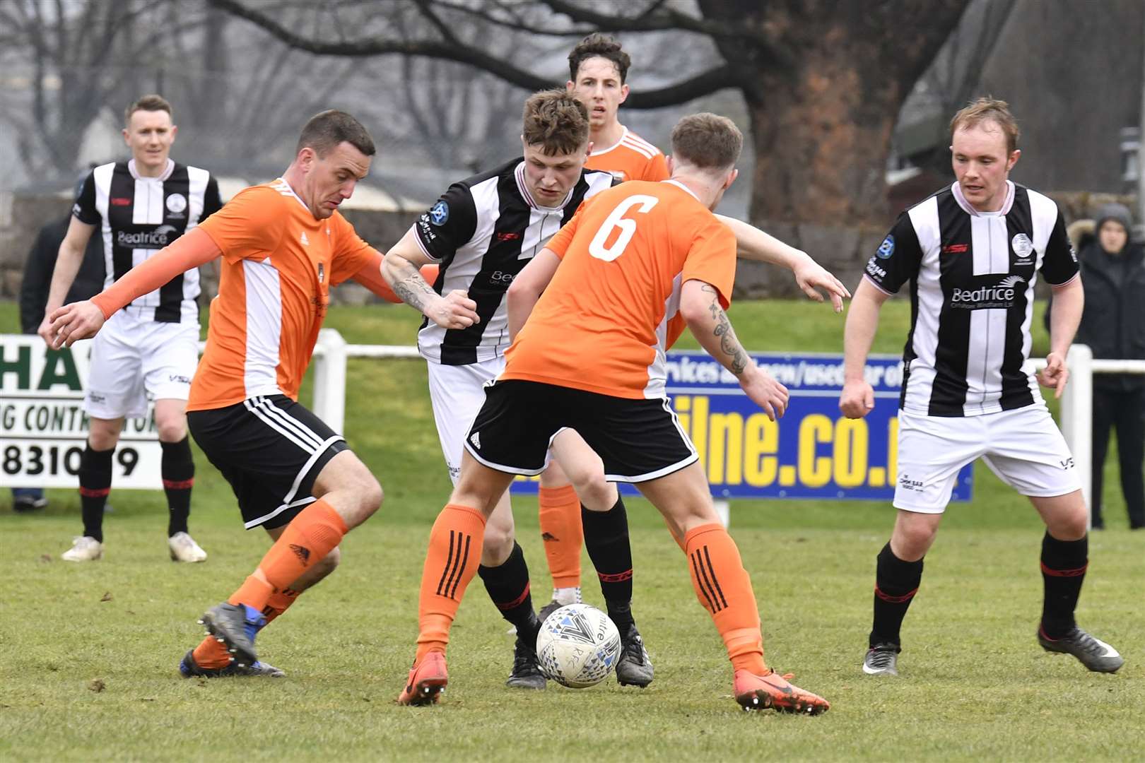Trialist Jakob Koziol on the ball for Academy against Rothes at Mackessack Park on Saturday. Gary Manson and Richard Macadie are the Wick players looking on. Picture: Bob Roger
