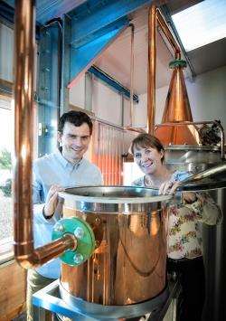 Martin and Claire Murray at work in the distillery. Picture: Mike Brooks Roper/ HIE