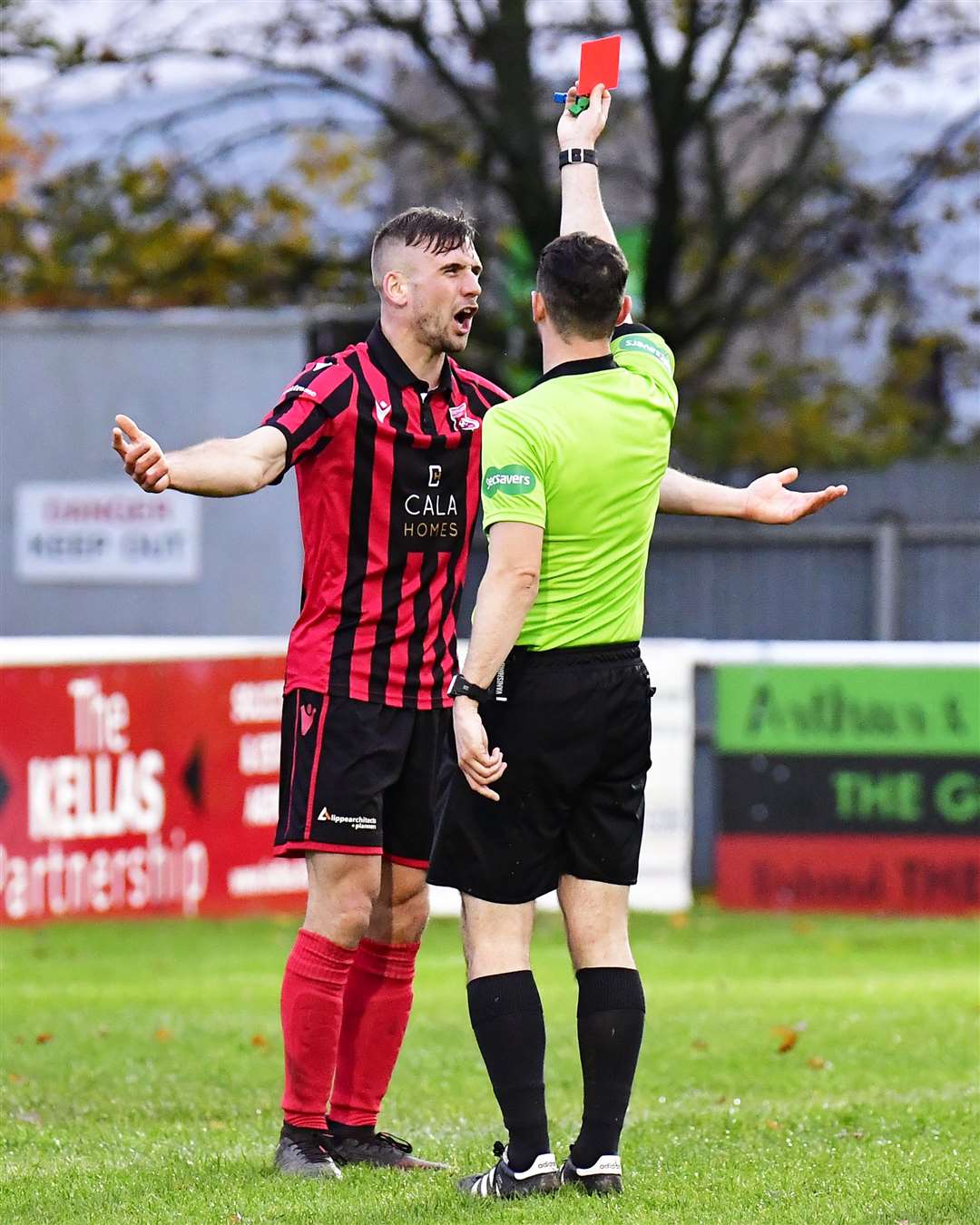 Inverurie's Mark Souter fumes as referee Liam Duncan shows him red card for bringing down Wick's Jack Halliday in the penalty box. Picture: Mel Roger