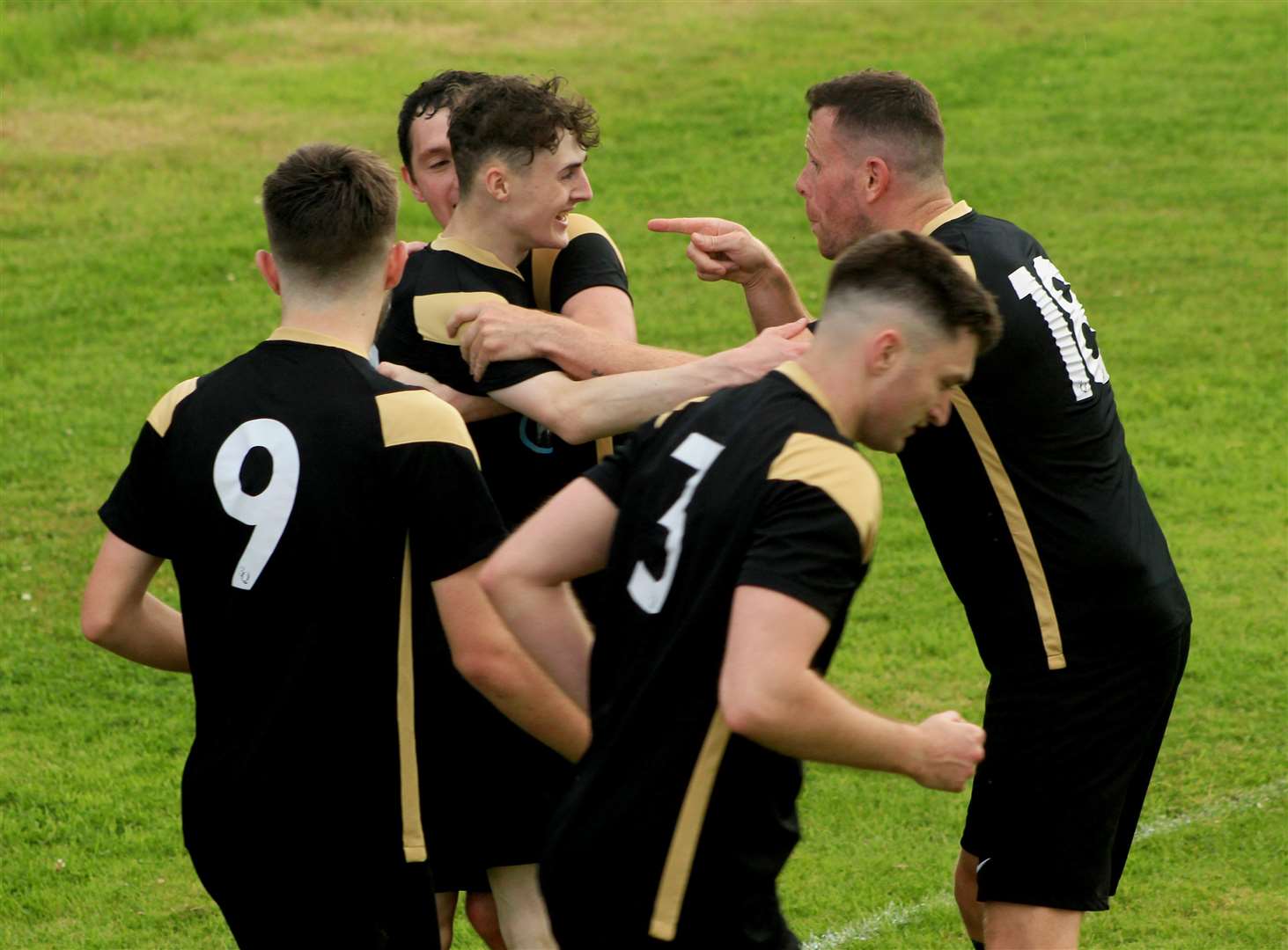 Acks players celebrate after Harvey Labor’s extra-time winner. Picture: Alan Hendry