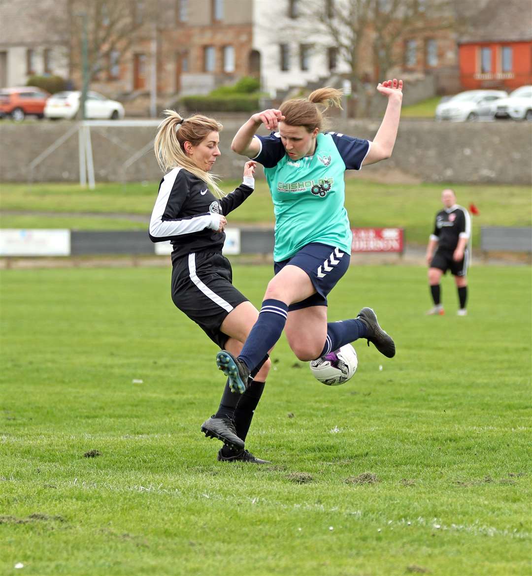 Caithness defender Rachel Campbell tackles a flying Rebecca McMillan. Picture: James Gunn