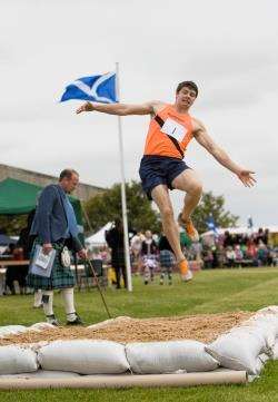 Andrew Raeburn competing in the long jump at Halkirk