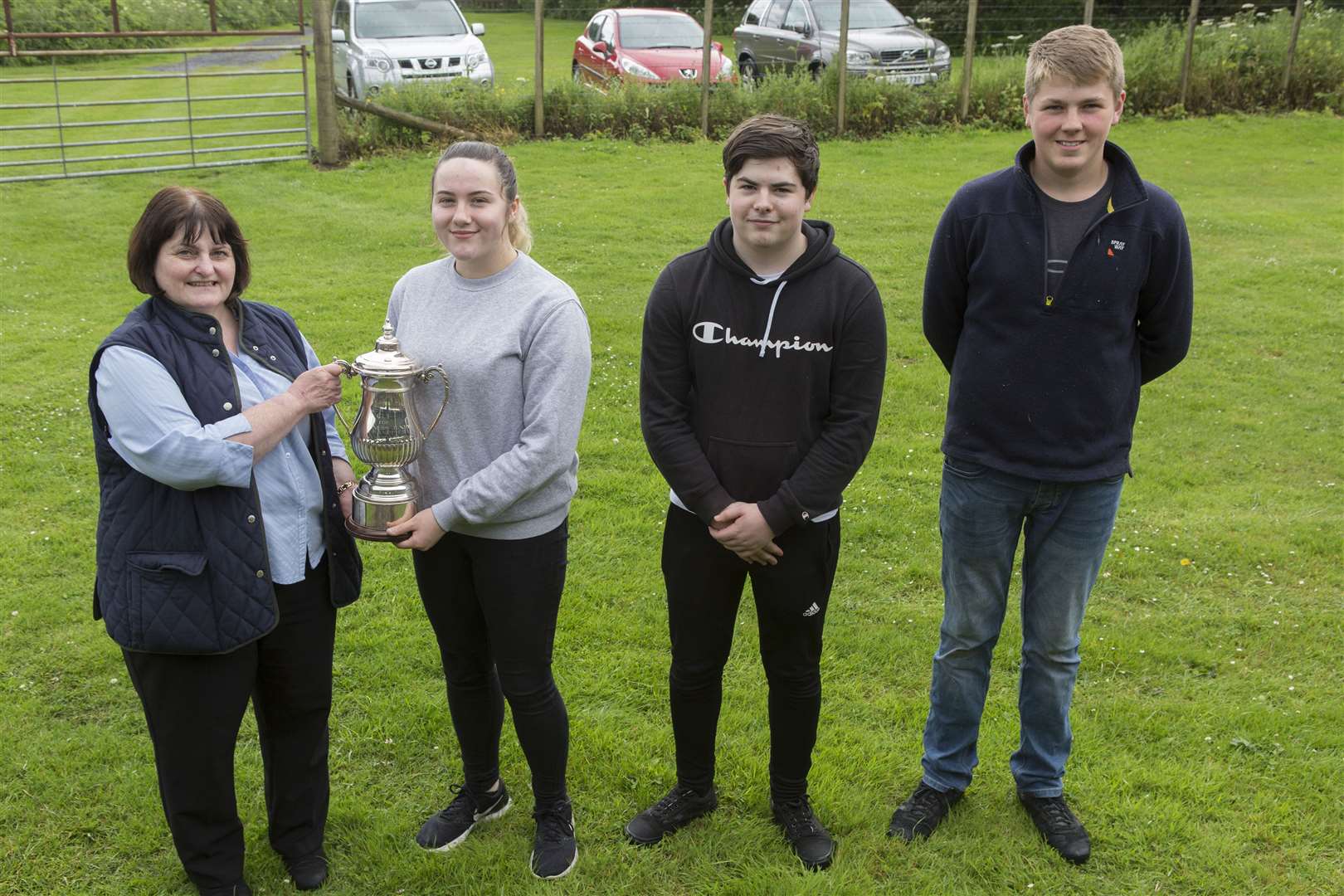 Caitlin's trophy was handed over by association secretary Marty Simpson. Looking are fellow Westfield club members Ali Baikie, who claimed second, and Murray Mackenzie (right), who was third. The competition was held at Wick Old Stagers' outdoor range. Picture: Robert MacDonald / Northern Studios