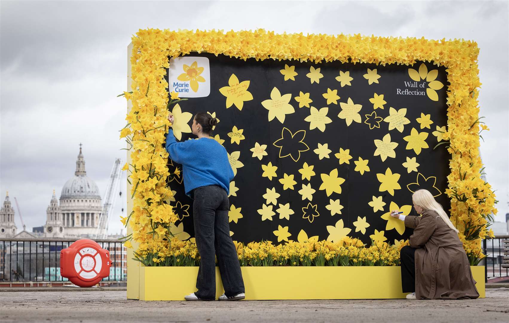 The Wall of Reflection, set up by charity Marie Curie, on London’s South Bank (Matt Alexander/PA)