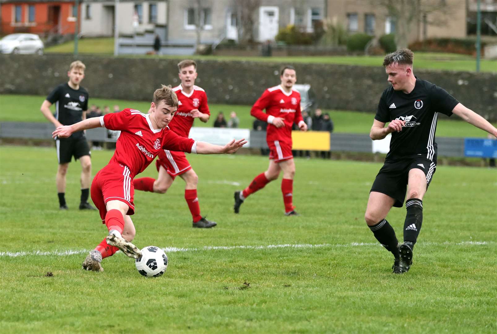 Cameron Montgomery during his time at Thurso, taking on the St Duthus defence during a North Caledonian League match in January this year. Picture: James Gunn
