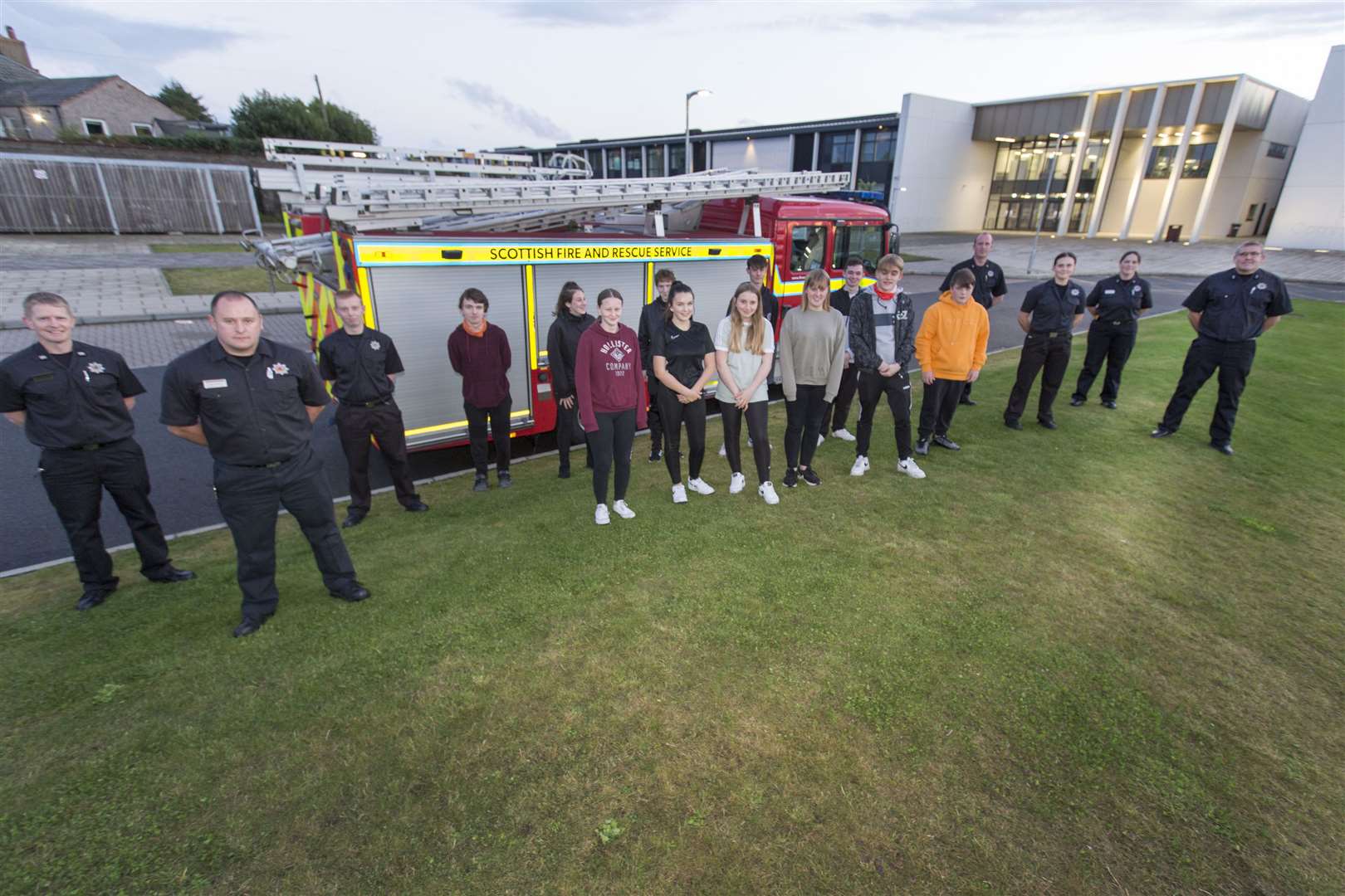Some of the young people taking part in the Wick Youth Volunteer Scheme along with some of the local firefighters (from left) Crew Commander Graeme Miller, firefighter Mark Waring, firefighter Graeme Sinclair, Watch Commander Andrew Mackay, the local scheme co-ordinator, firefighter Abbie Douglas, Watch Commander Kara Simpson and Watch Commander Colin Gunn. Picture: Robert MacDonald/Northern Studios