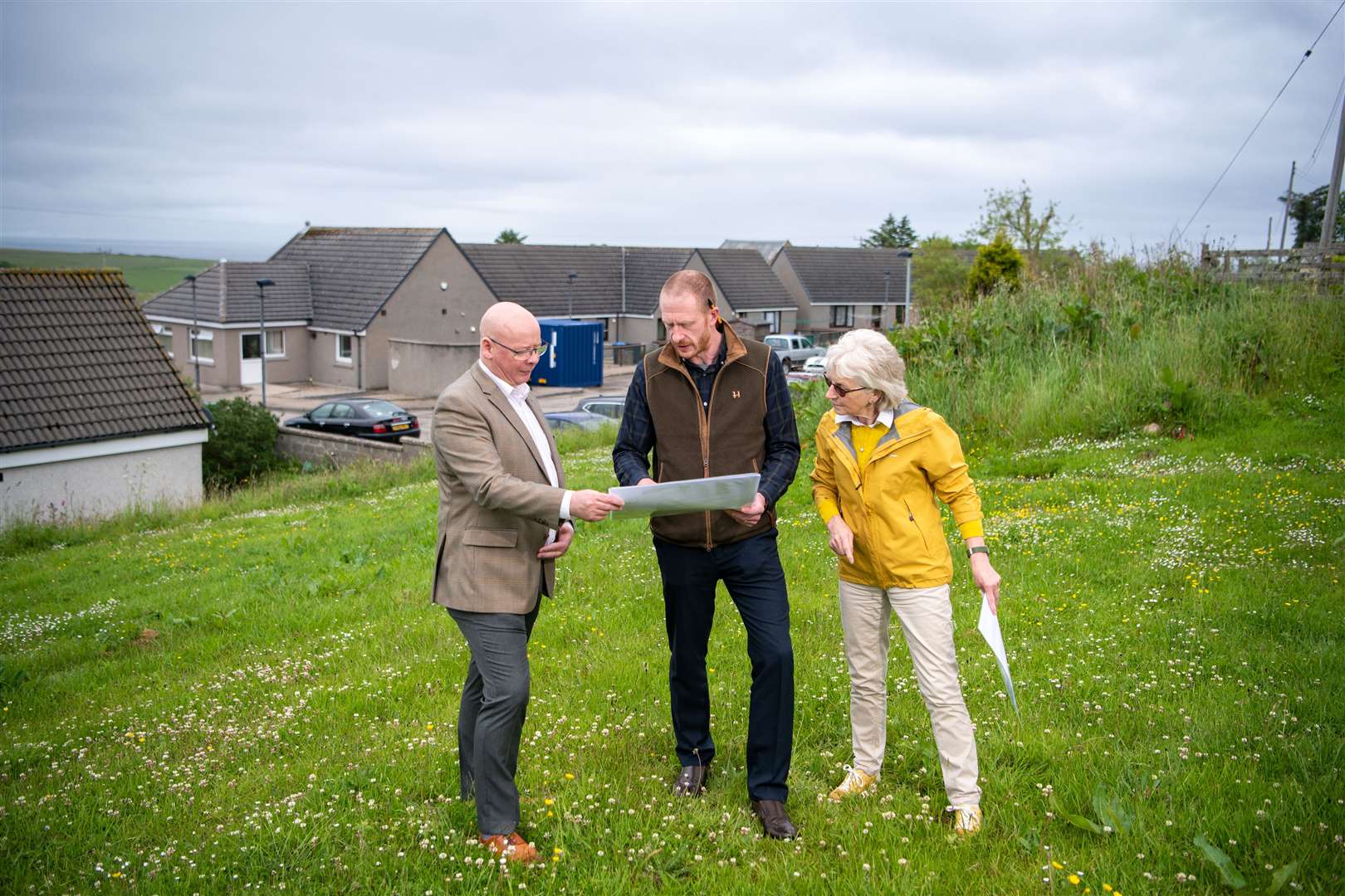 Daniel Macleod with representatives of SSE at the site of the Dunbeath and District Centre development.