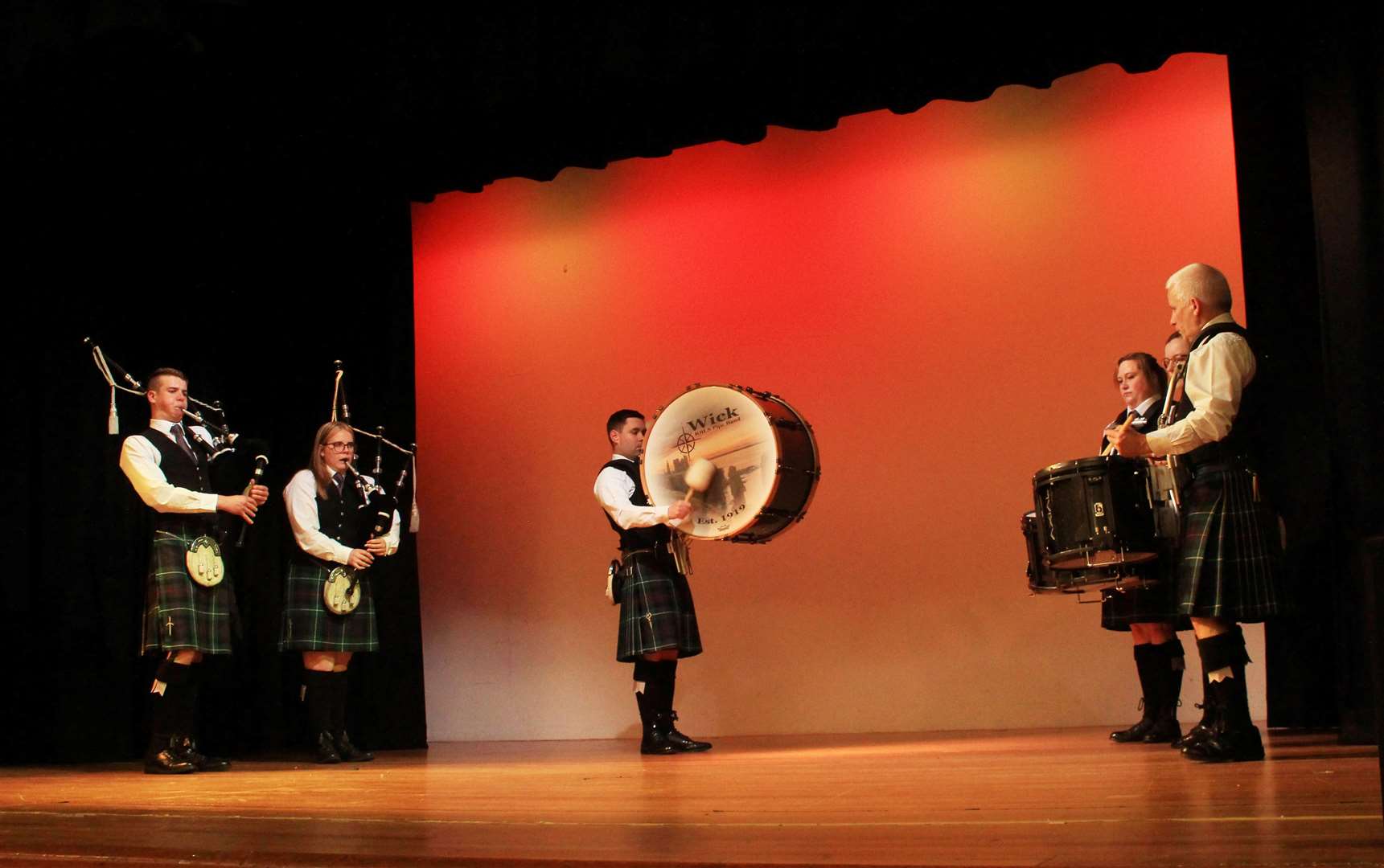 Members of Wick RBLS Pipe Band on stage at the Assembly Rooms. Picture: Alan Hendry