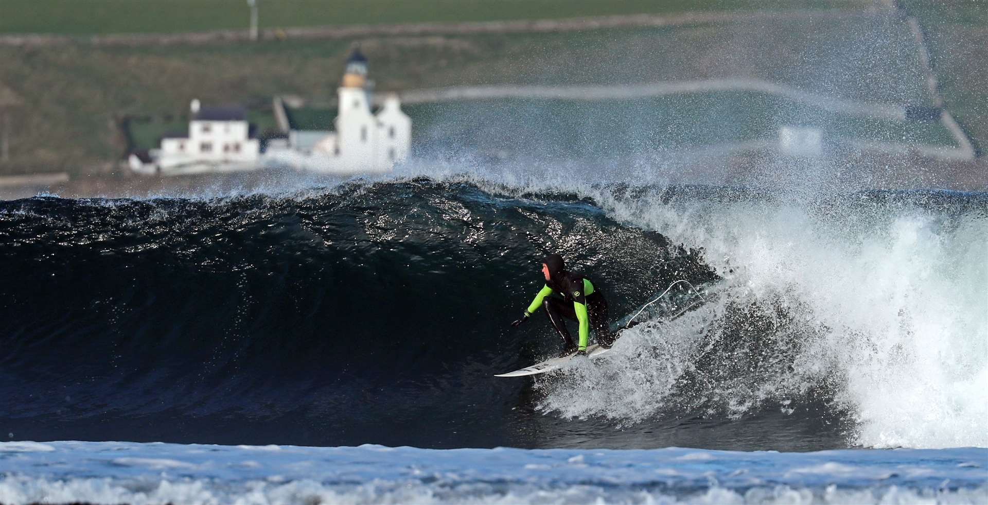 Scottish champion Mark Boyd catches a wave at Thurso East on Thursday. Picture: James Gunn