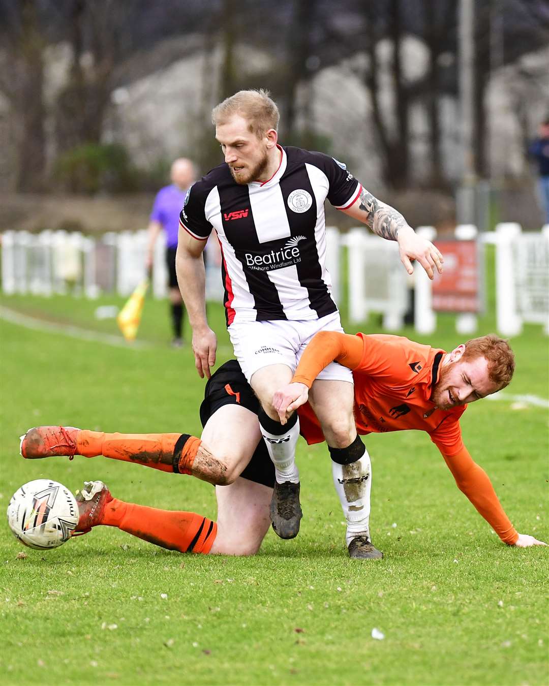 Greg Morrison of Rothes gets to grips with Alan Hughes during a 2-2 draw at Mackessack Park earlier in the season. Picture: Mel Roger