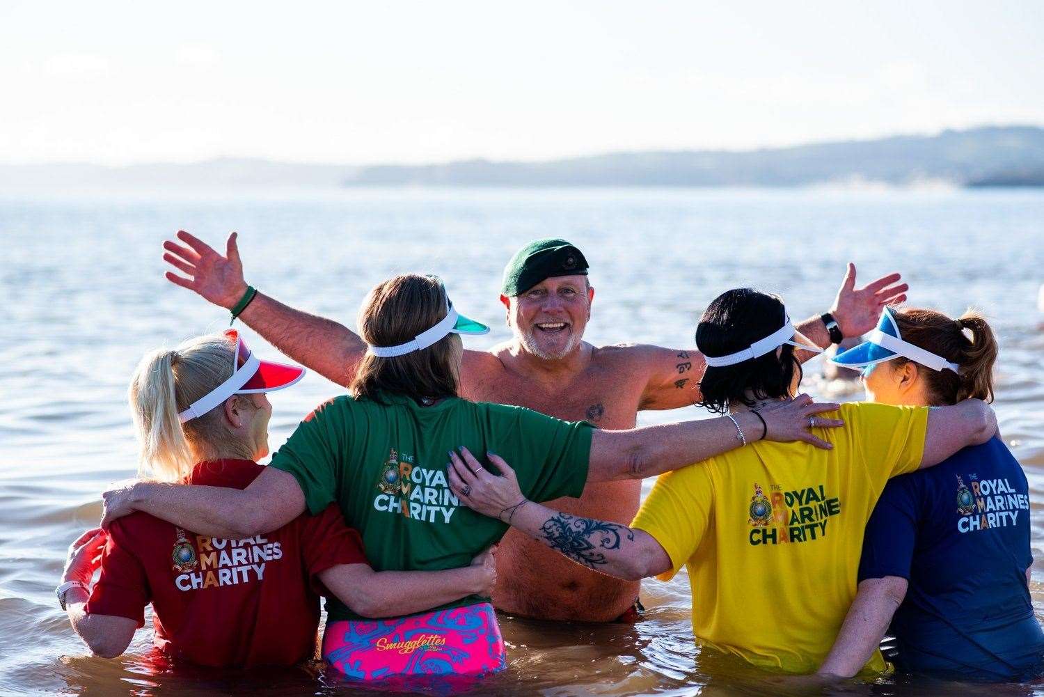 Tim was joined by some 30 supporters, including former commando colleagues, at his Exmouth dip. Picture: Dotty Creative