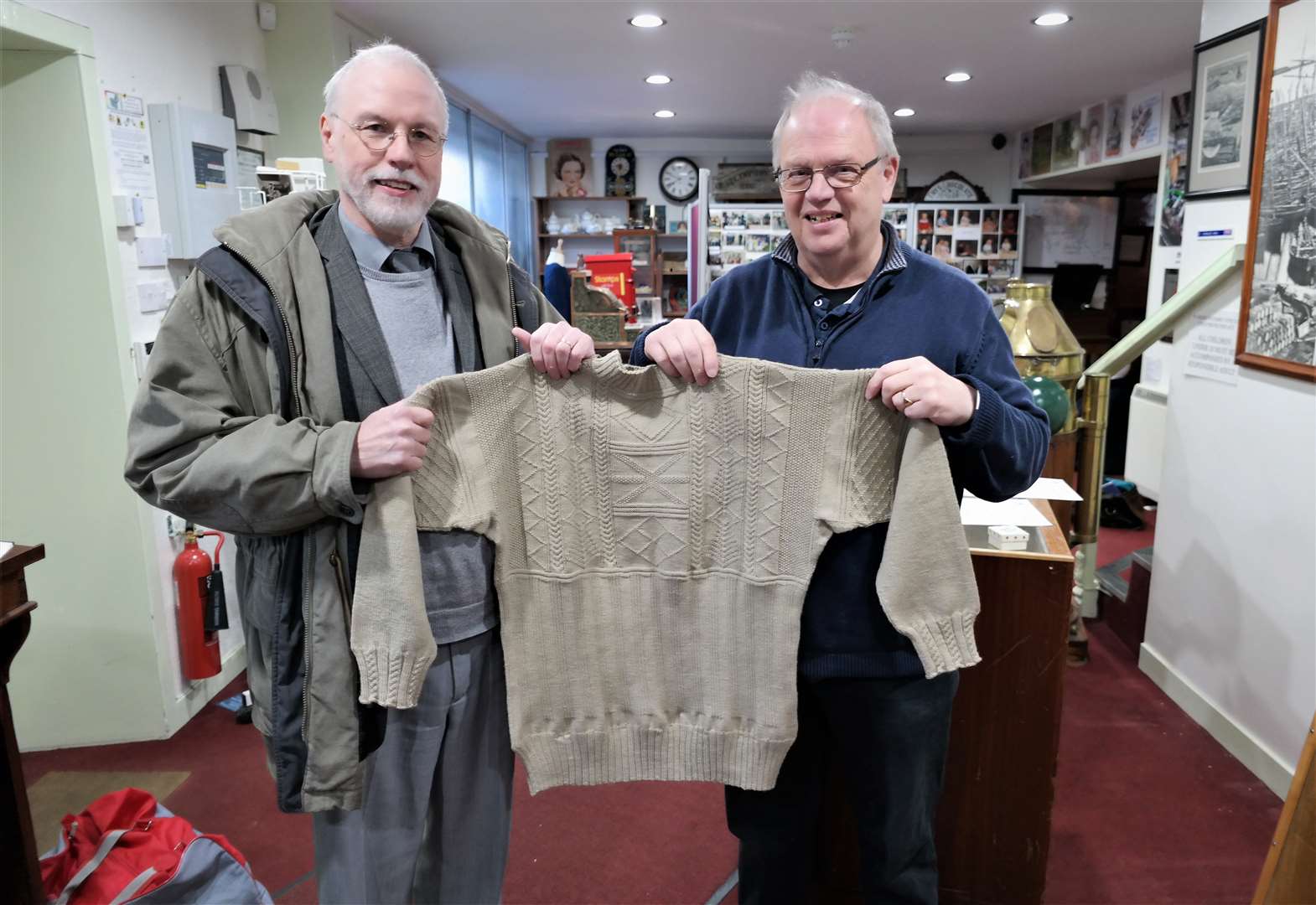Gordon Reid (left) holds a gansey he knitted along with Ian Leith from Wick Heritage Museum. Pictures: DGS