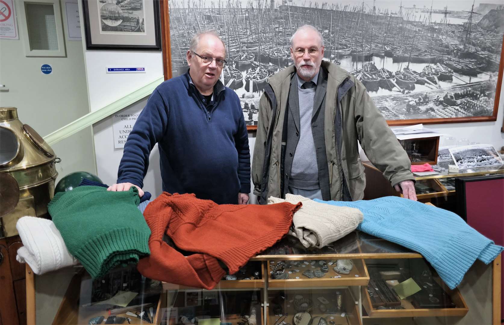 Ian Leith (left) from Wick Heritage Museum beside Gordon Reid and the ganseys he knitted. Picture: DGS