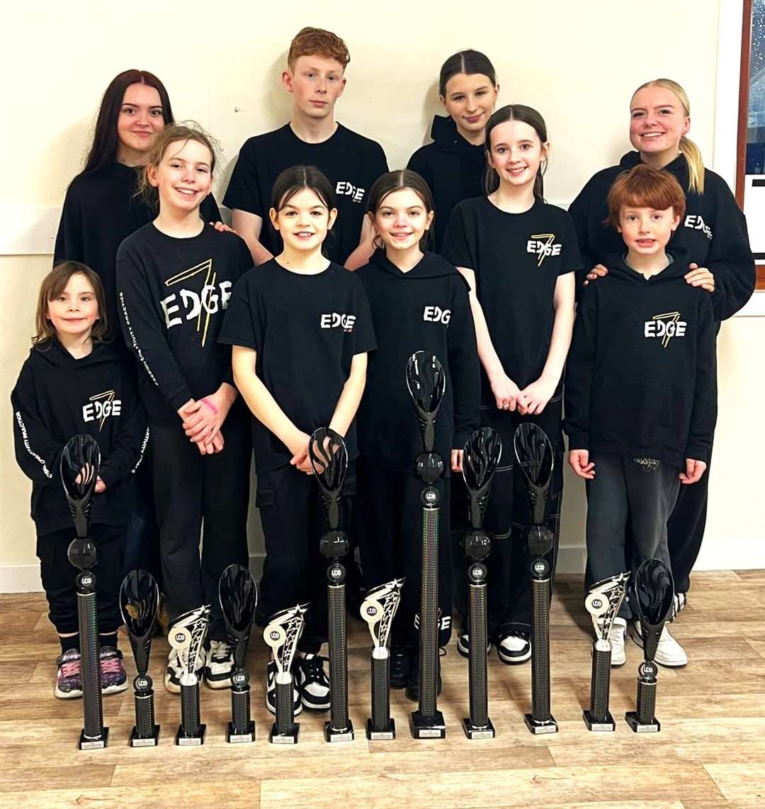 The Edge dance team pictured with their trophies. From left at front, Amber Gibson, Eilidh Sinclair, Iris Cormack, Fearne Coghill, Molly Cannop and Owen Sinclair. Back row from left, instructor Laya Cowie, Craig Campbell, Kelsey Norquay, and instructor Kelsey Ross. Missing from the photo is instructor and dancer Chloe Macgregor. Picture supplied