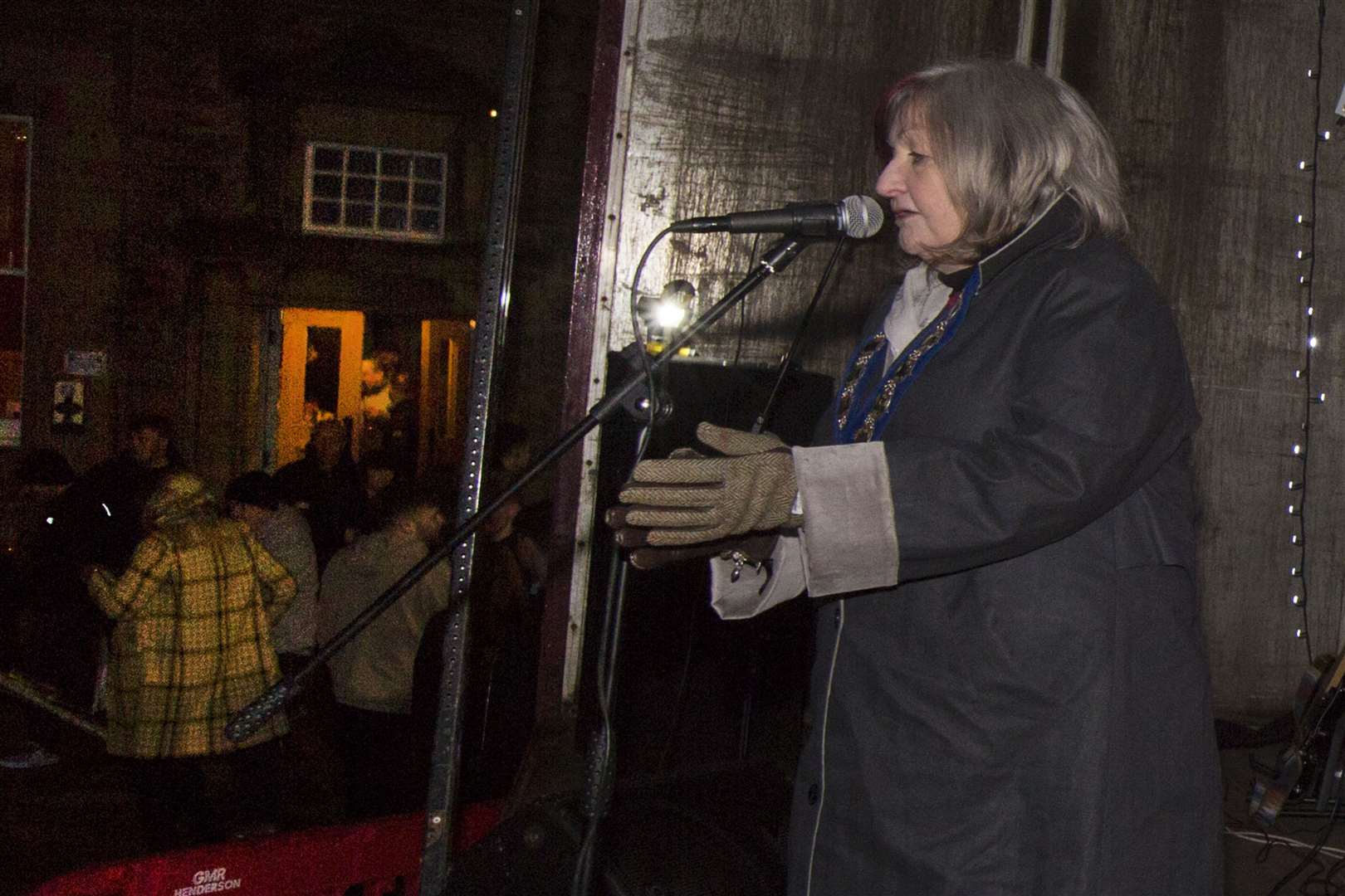 Wick Provost Jan McEwan welcomes the arrival of the New Year as she addresses the gathering in Wick's Market Square. Picture: Robert MacDonald/Northern Studios