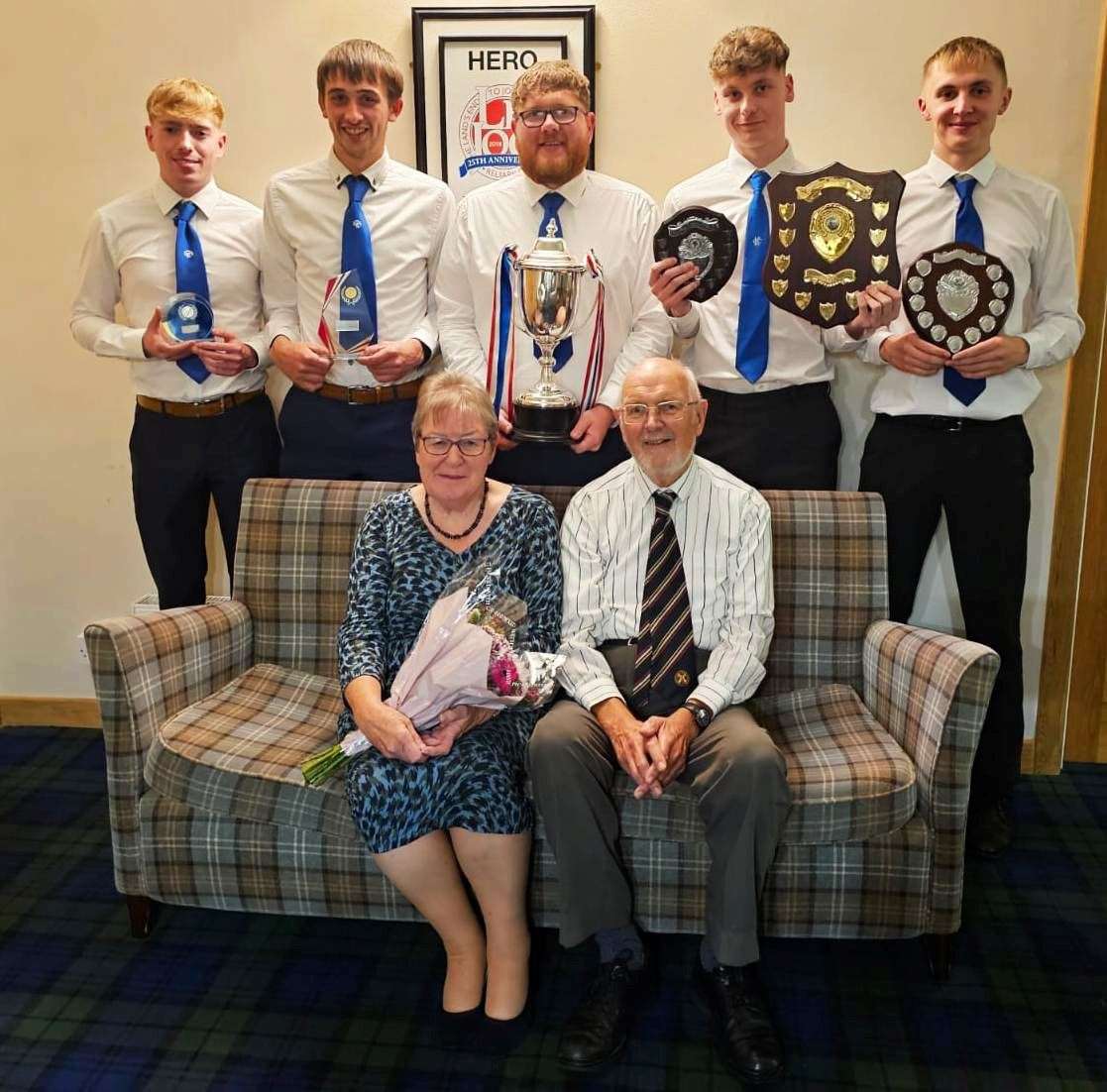 From left (standing): Ryan Calder, most improved player; Sean Campbell, manager’s player of the year; Bradley Thomson, manager; Oliver Manton, player of the year and top scorer; and Carter Mackay, young player of the year, with Margaret and Ken Wood. Picture: Angus Mackay