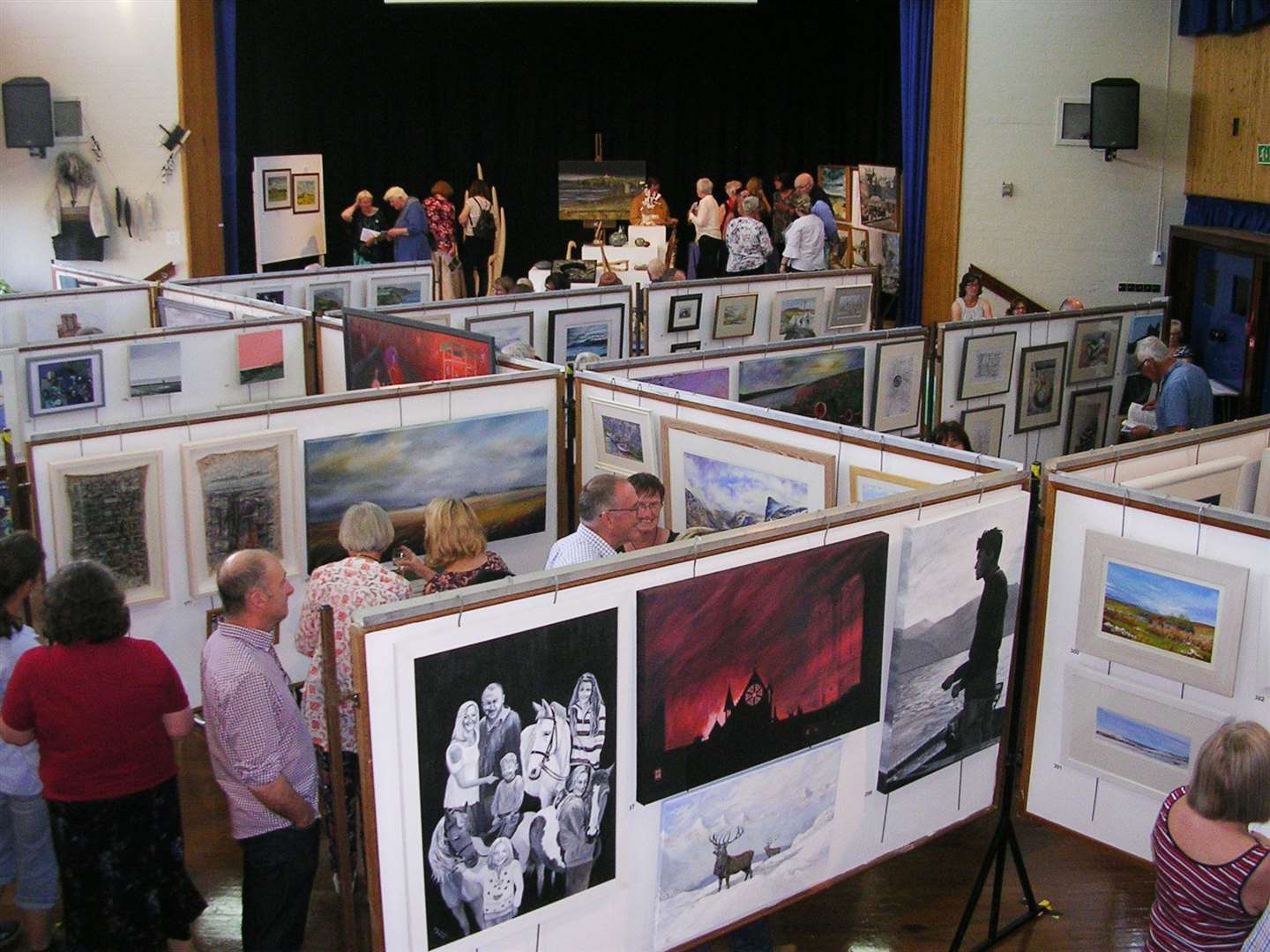 Visitors at the preview of last year's exhibition in Thurso High School.
