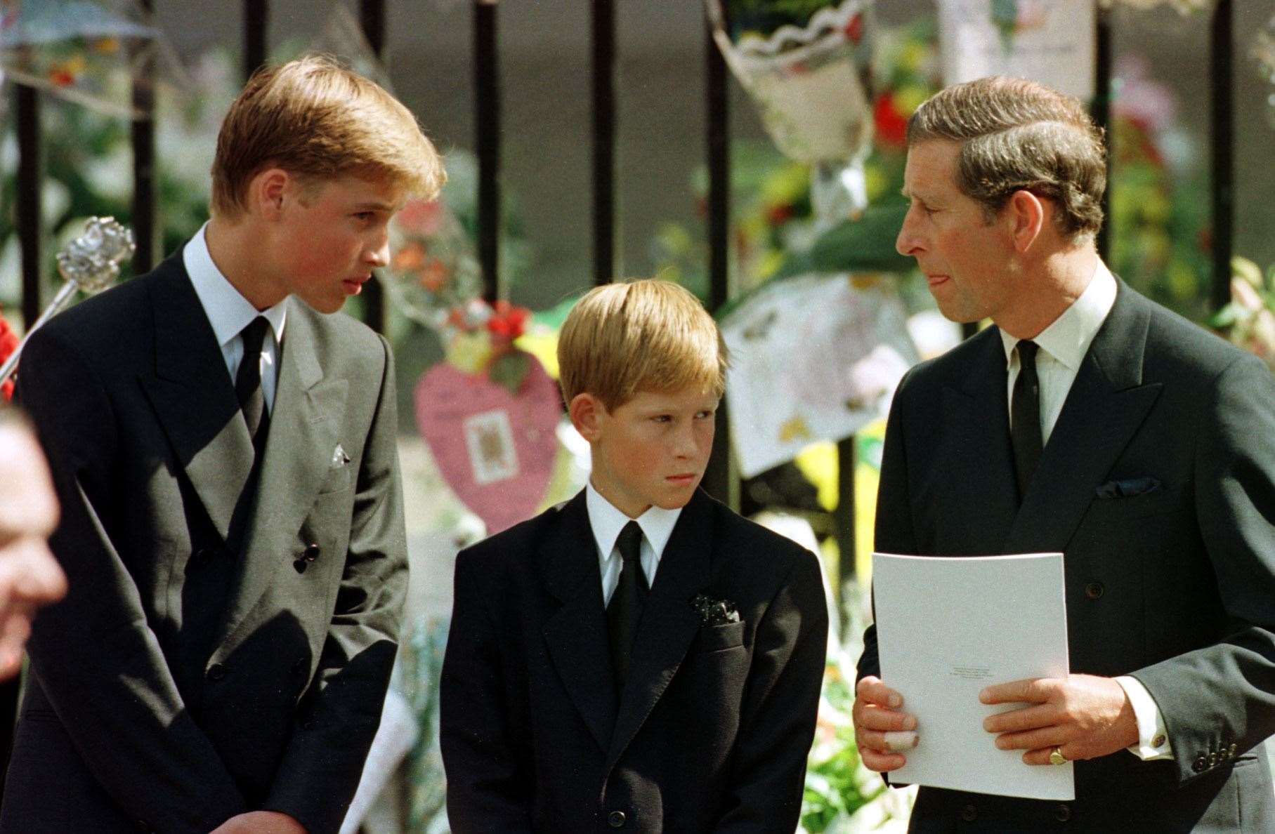 The Prince of Wales with William and Harry on the day of Diana’s funeral (Adam Butler/PA)