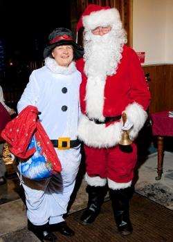 Local councillor Willie Mackay and his wife, Glynis, took on the roles of Santa and his little helper at the Caithness Horizons grotto. Photos: Mel Roger.