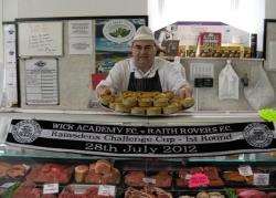 Butcher Neil Harrold with a batch of pies bound for Harmsworth Park.