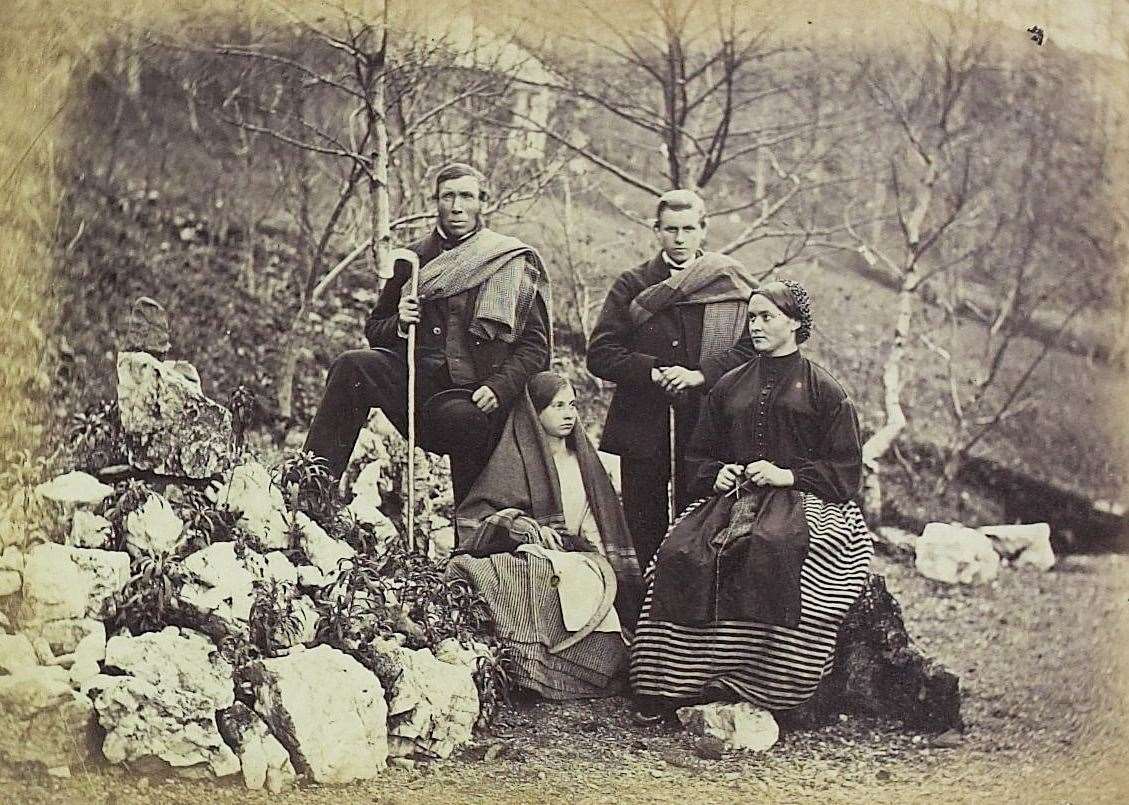 An example of a photo held by National Records of Scotland. It shows estate workers Andrew Clark, Flora Gillies, Willie Hall and Minnie Hall on Invercreran Estate. Crown copyright, NRS, GD1/1208/1/64