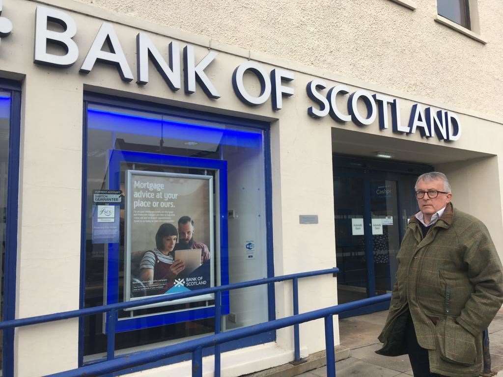 Jamie Stone outside Golspie's Bank of Scotland, the last remaining bank branch in Sutherland.