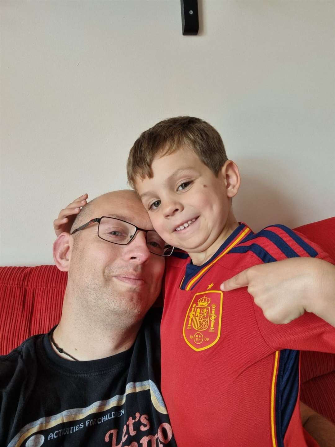 Adrian Salamon watched the match with his son Tristan, six, who is happy about Spain’s win despite supporting the Lionesses (Adrian Salamon/PA)