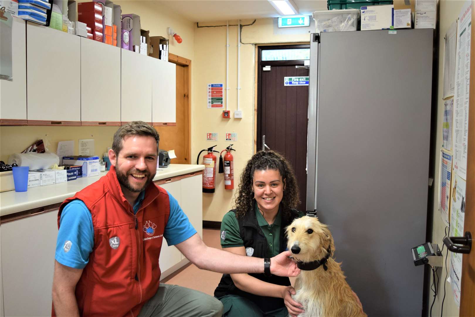 The Highland Vet is back with a new series. Vet Ken Wilson and veterinary nurse Caitlin along with young Loki, owned by fellow team member Bridget Holt. Picture: Daisybeck Studios/MCG