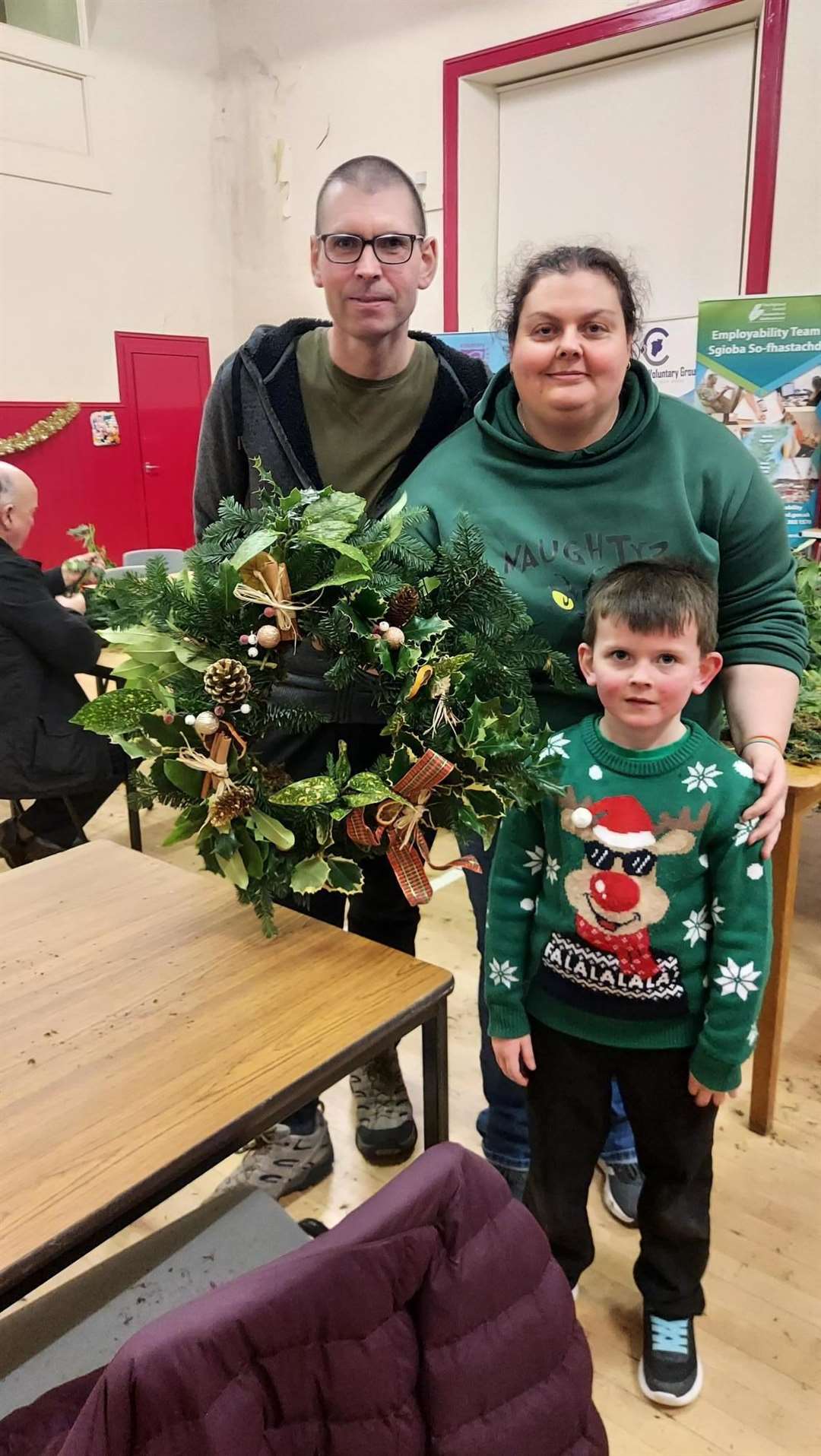 One of the families who enjoyed the festive wreath making event