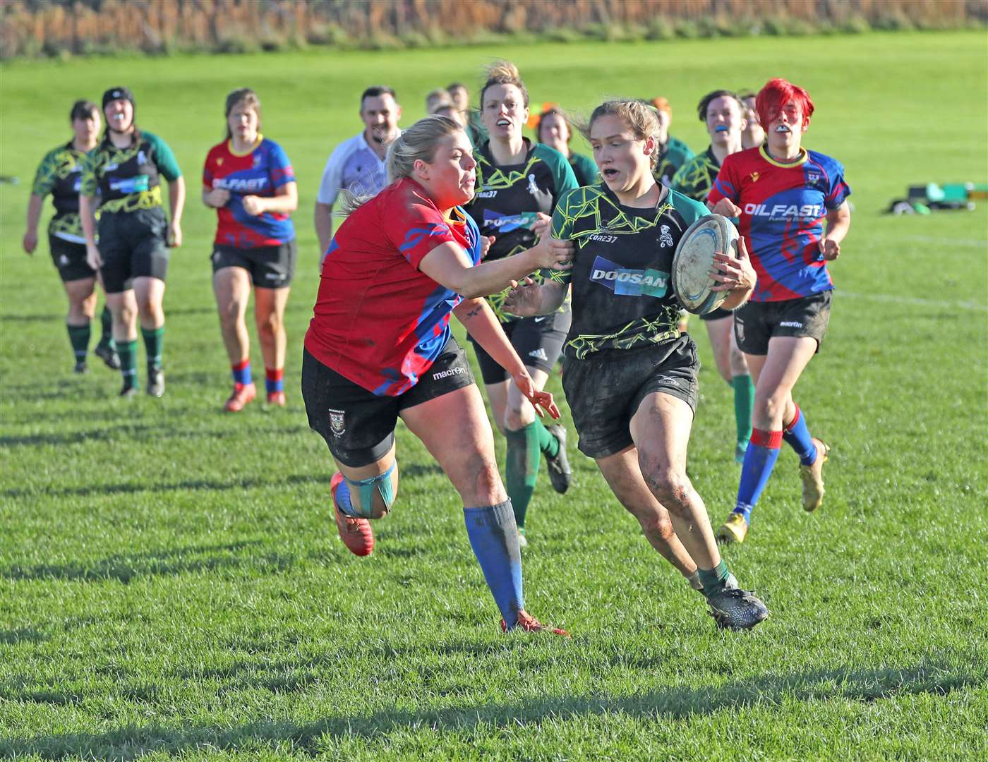 Emily Flavell tries to get round a Craig Dunain defender. Picture: James Gunn