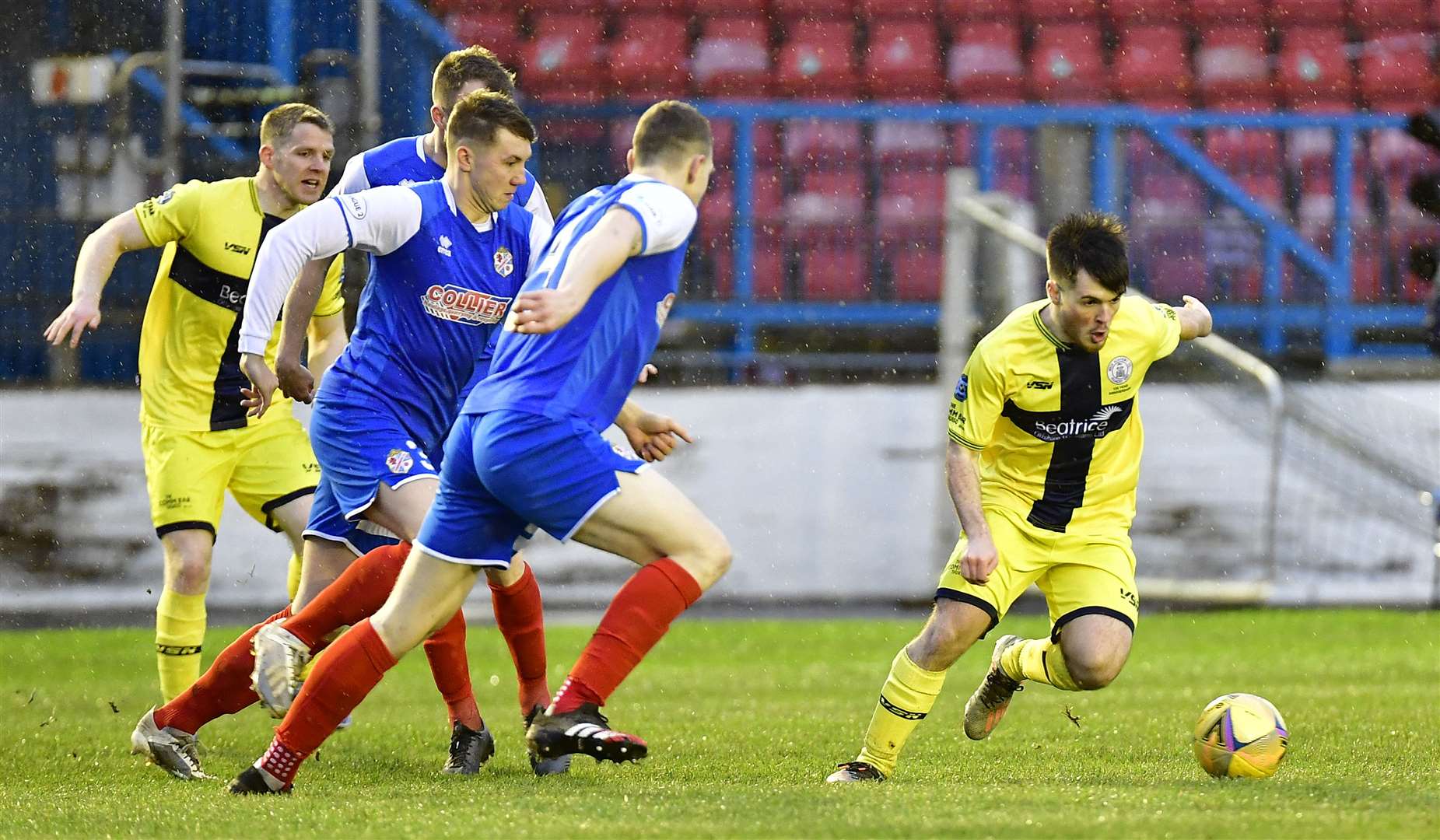 Wick Academy's Sean Campbell gets away from the Cowdenbeath defence. Picture: Mel Roger