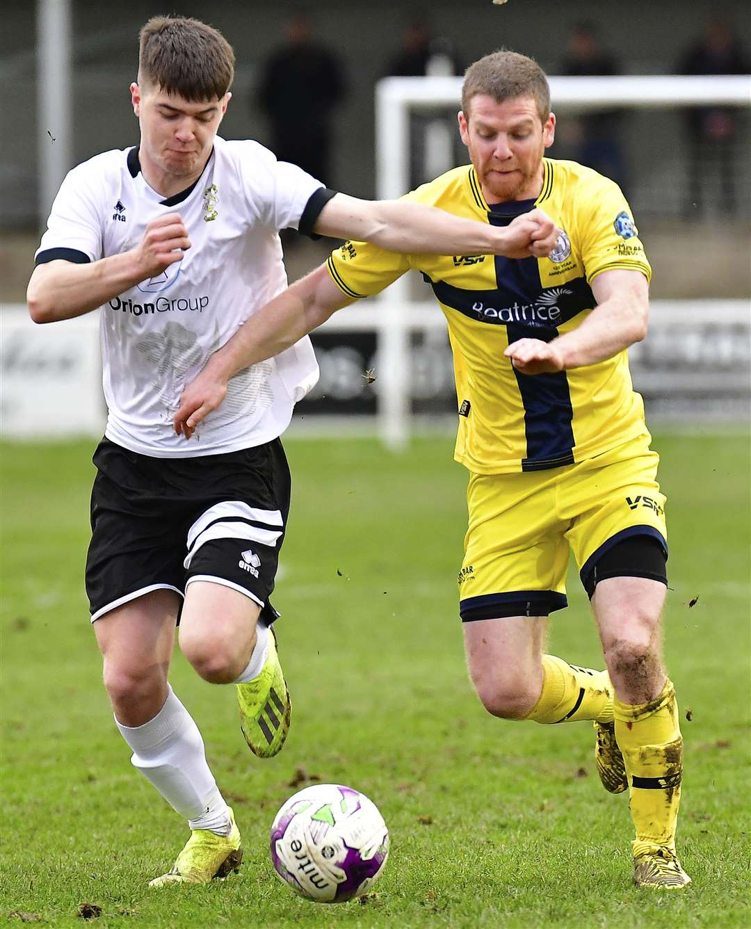 Colin MacRae (left) holds off Davie Allan during a Highland League match between Clach and Wick Academy earlier this year. Picture: Mel Roger