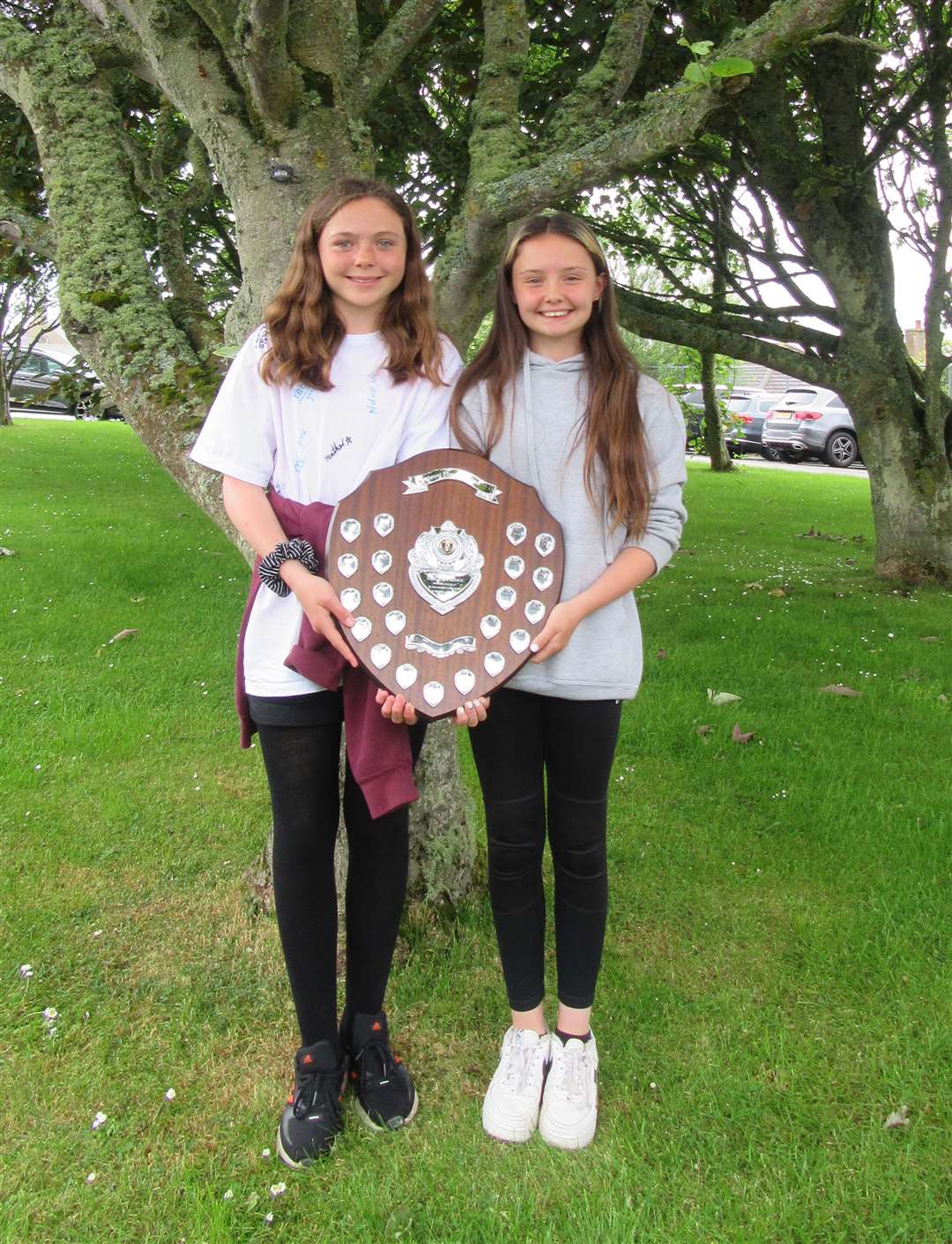 Harald house captains Anna Trueman and Brooke O’Hare with the winners' shield for the sports day challenge.