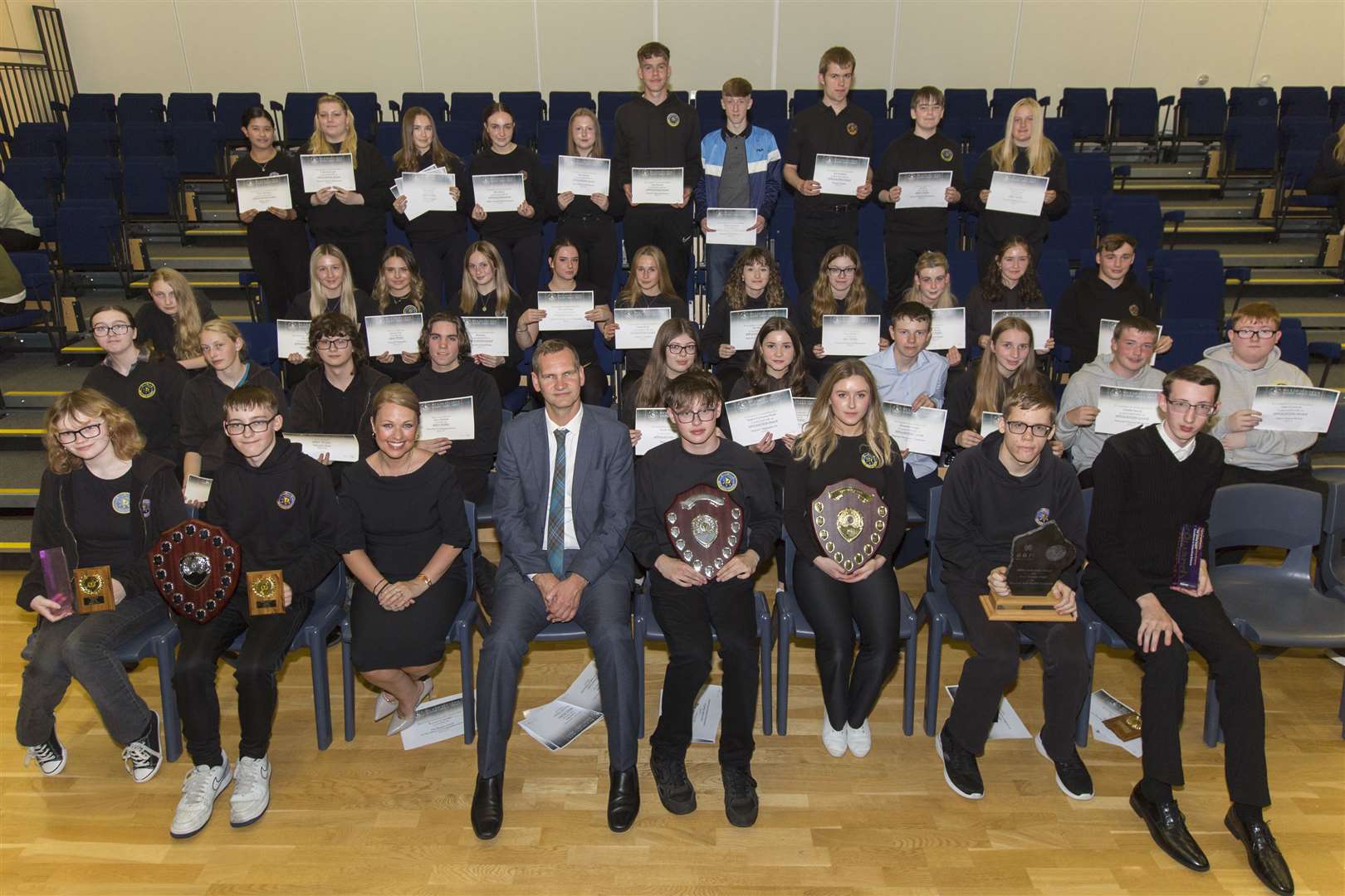 Some of Wick High School's prize and trophy winners from the past academic year pose for a group photograph along with head teacher Sebastian Sandecki and guest speaker Gail Ross. Picture: Robert MacDonald/Northern Studios