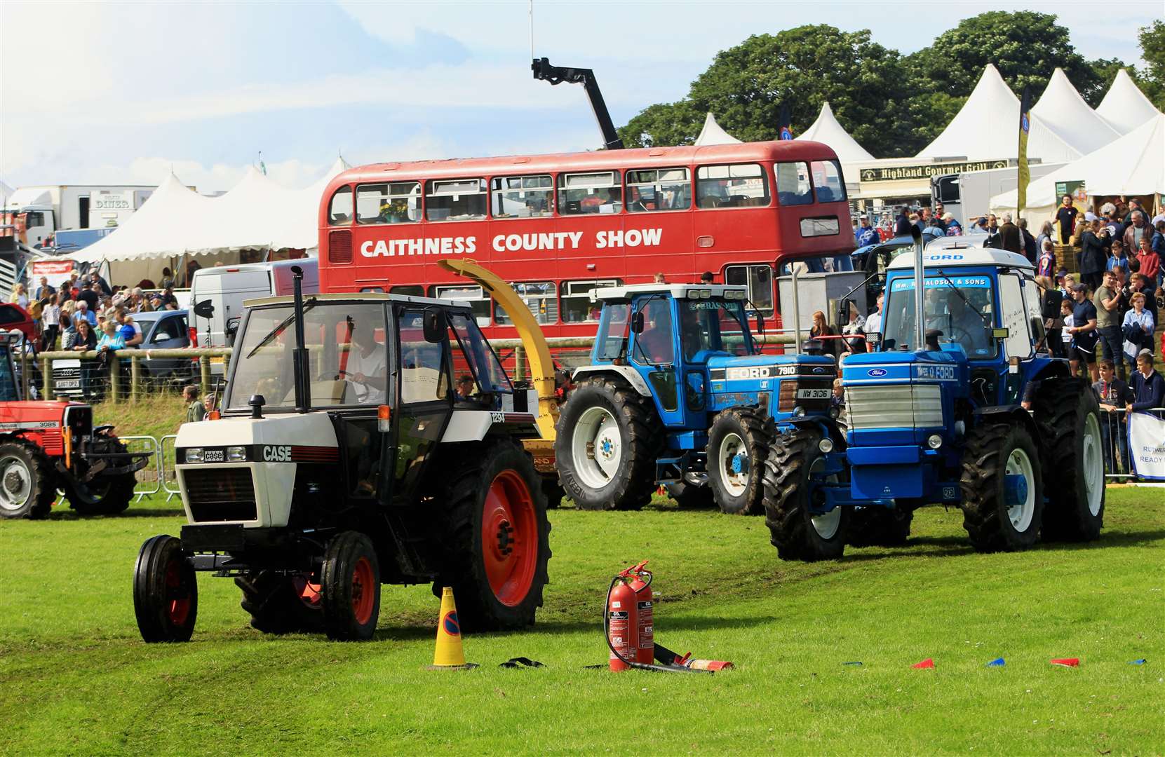 Tractors old and new paraded around the main ring. Picture: Alan Hendry