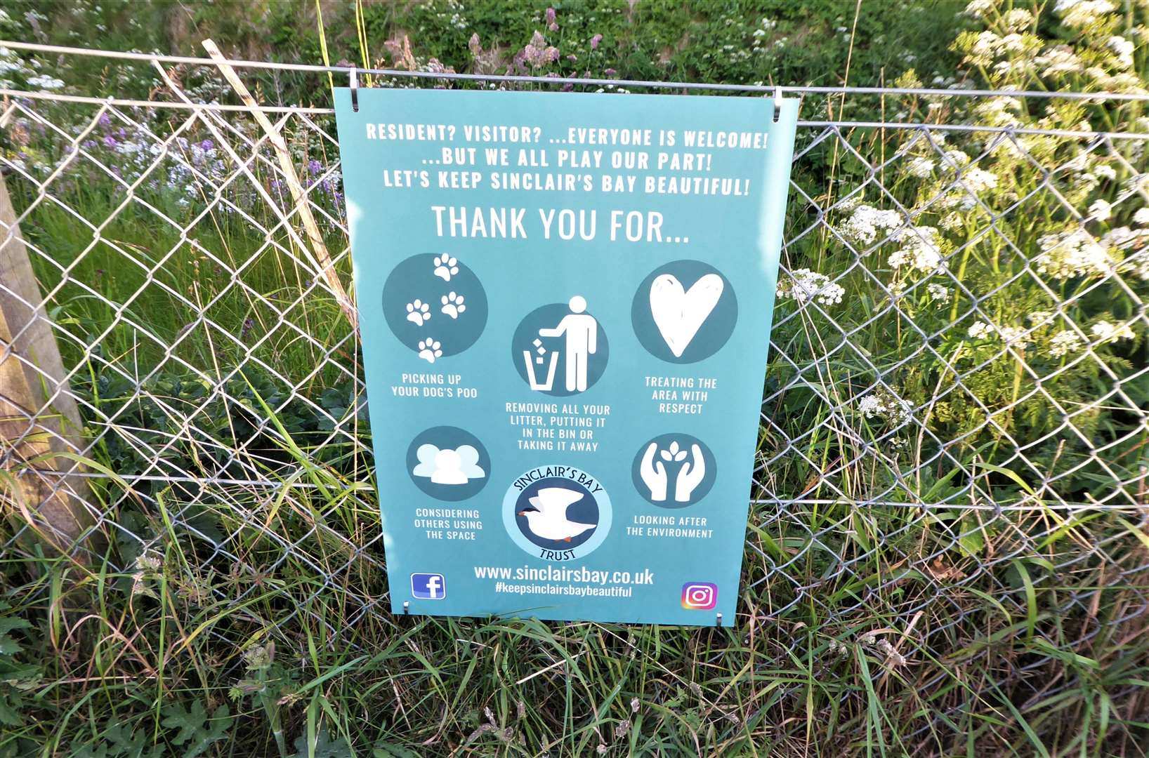 A sign erected by the trust near Reiss beach with information to encourage responsible use of, and respect for, public spaces in the Sinclair’s Bay community.