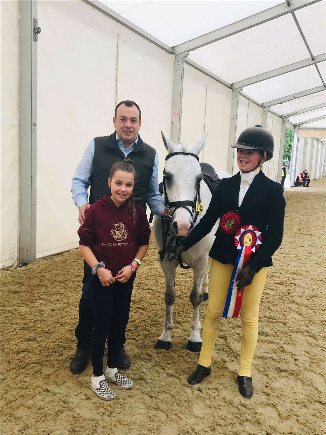 Will Calder, with daughter Jessica who celebrated her 11th birthday at HOYS, along with Coco Bongo and rider Chloe Lemieux.
