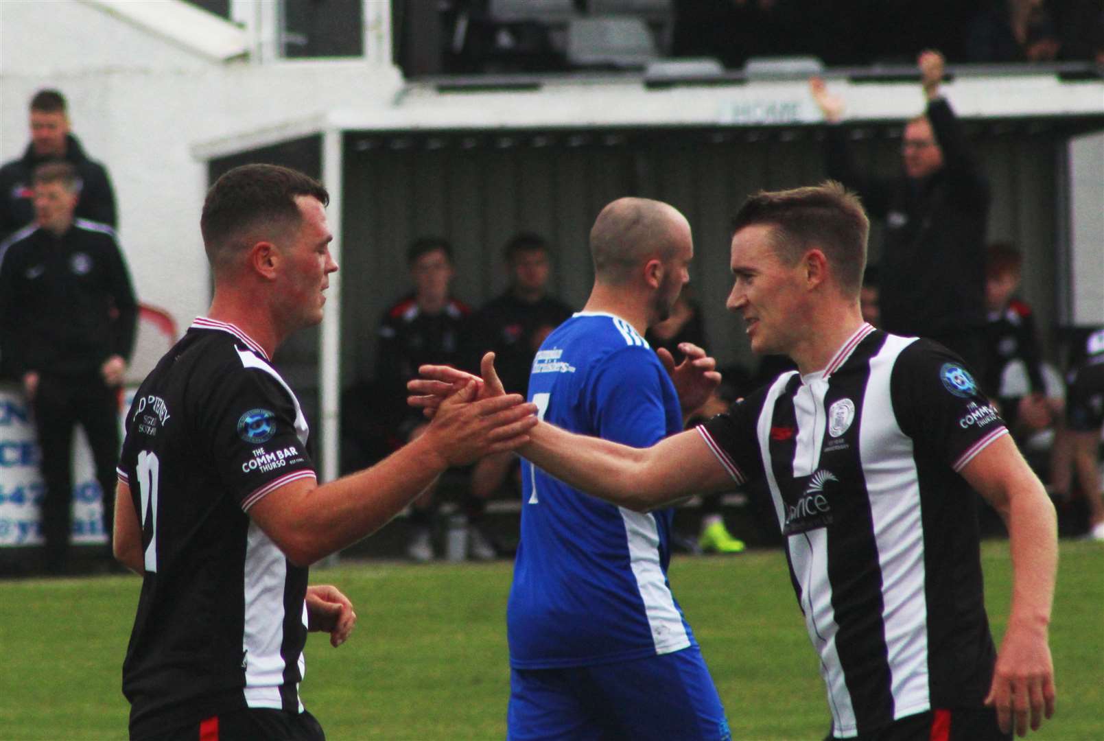 Gordon MacNab is congratulated by Gary Manson after the striker netted Academy's fourth goal.