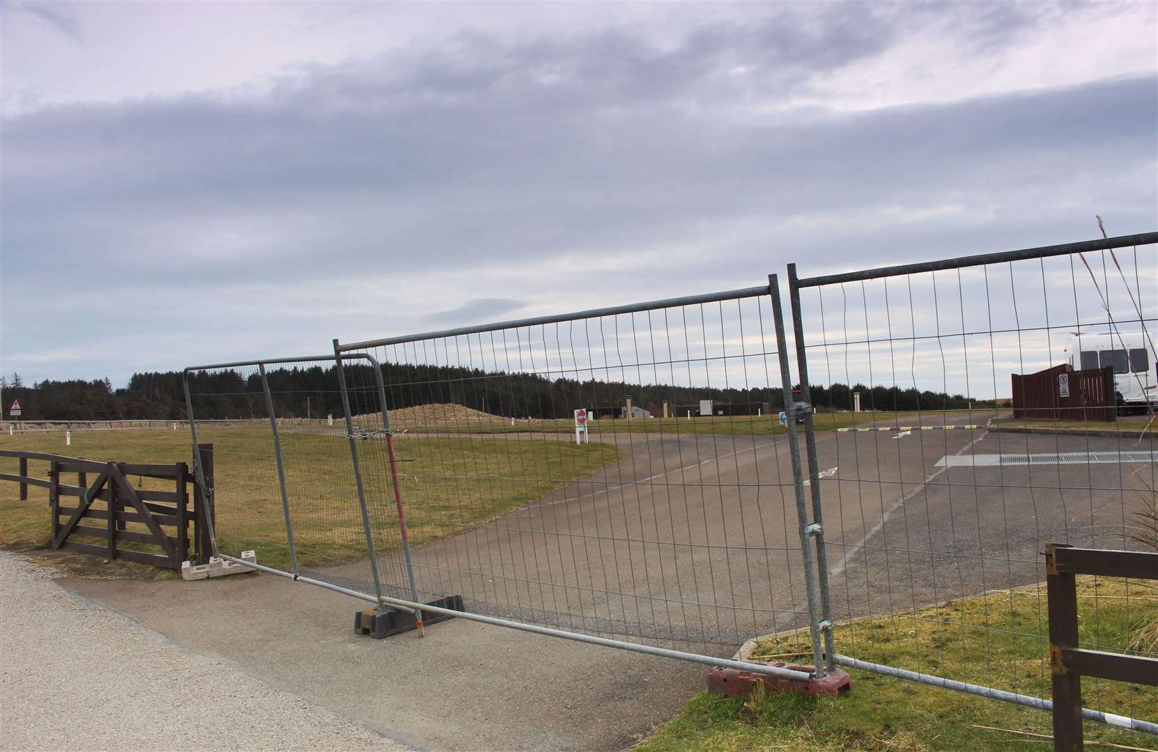 The locked gates of the Caravan and Motorhome Club's site at Dunnet Bay on Sunday. It would have been due to open for the season on March 20. Jamie Stone understands that there is no agreed policy as to whether caravan sites should be allowed to continue operating. Picture: Alan Hendry