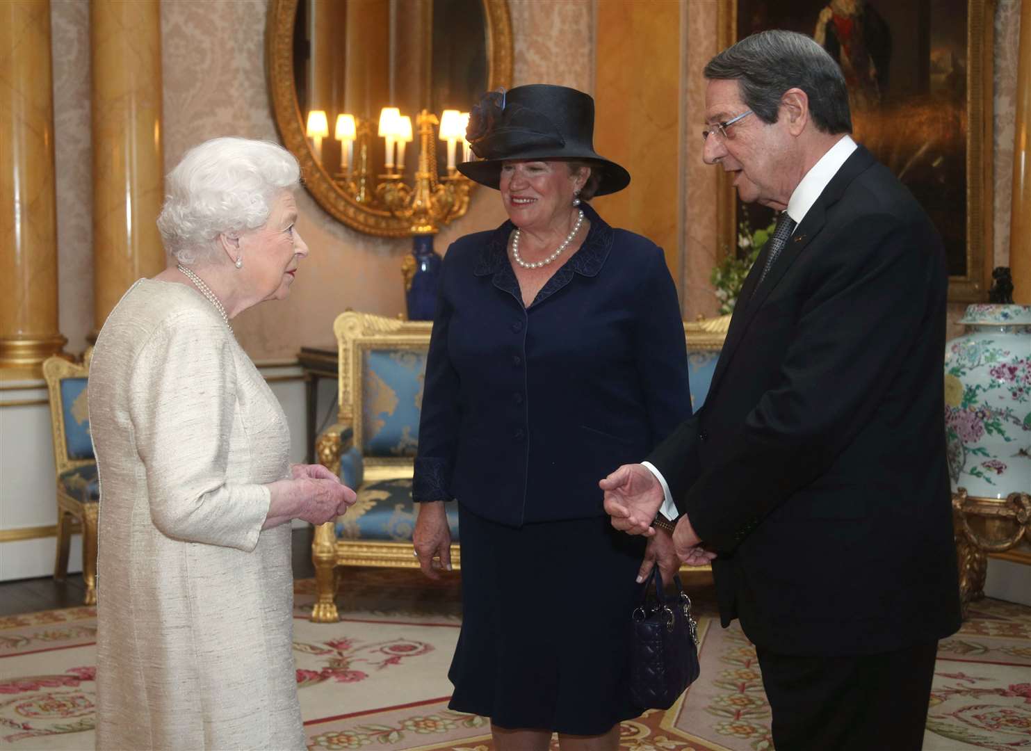 President of the Republic of Cyprus Nicos Anastasiades and his wife, Andri Anastasiades, during an audience with the Queen in 2019 (Yui Mok/PA)