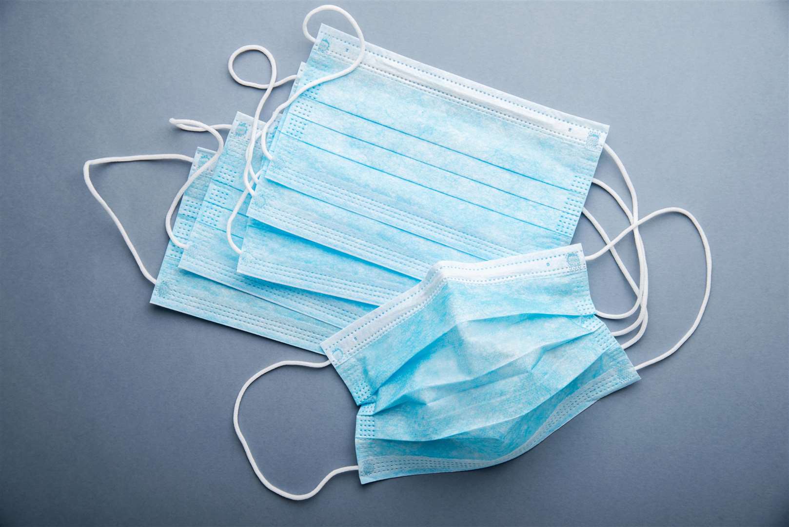 Staff, patients and visitors in all hospital and care settings should now use fluid resistant surgical masks.