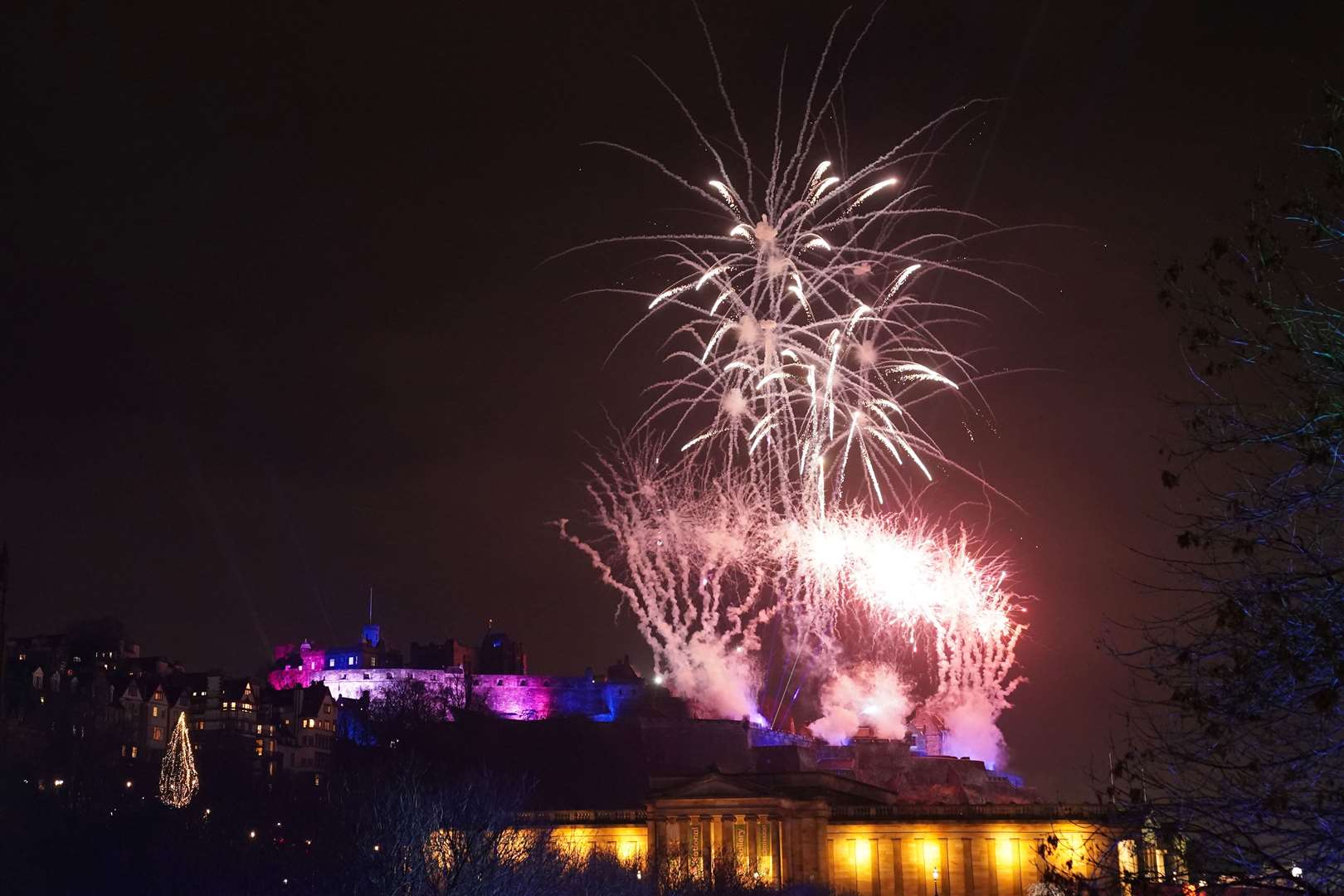 Fireworks explode over Edinburgh Castle (Jane Barlow/PA)