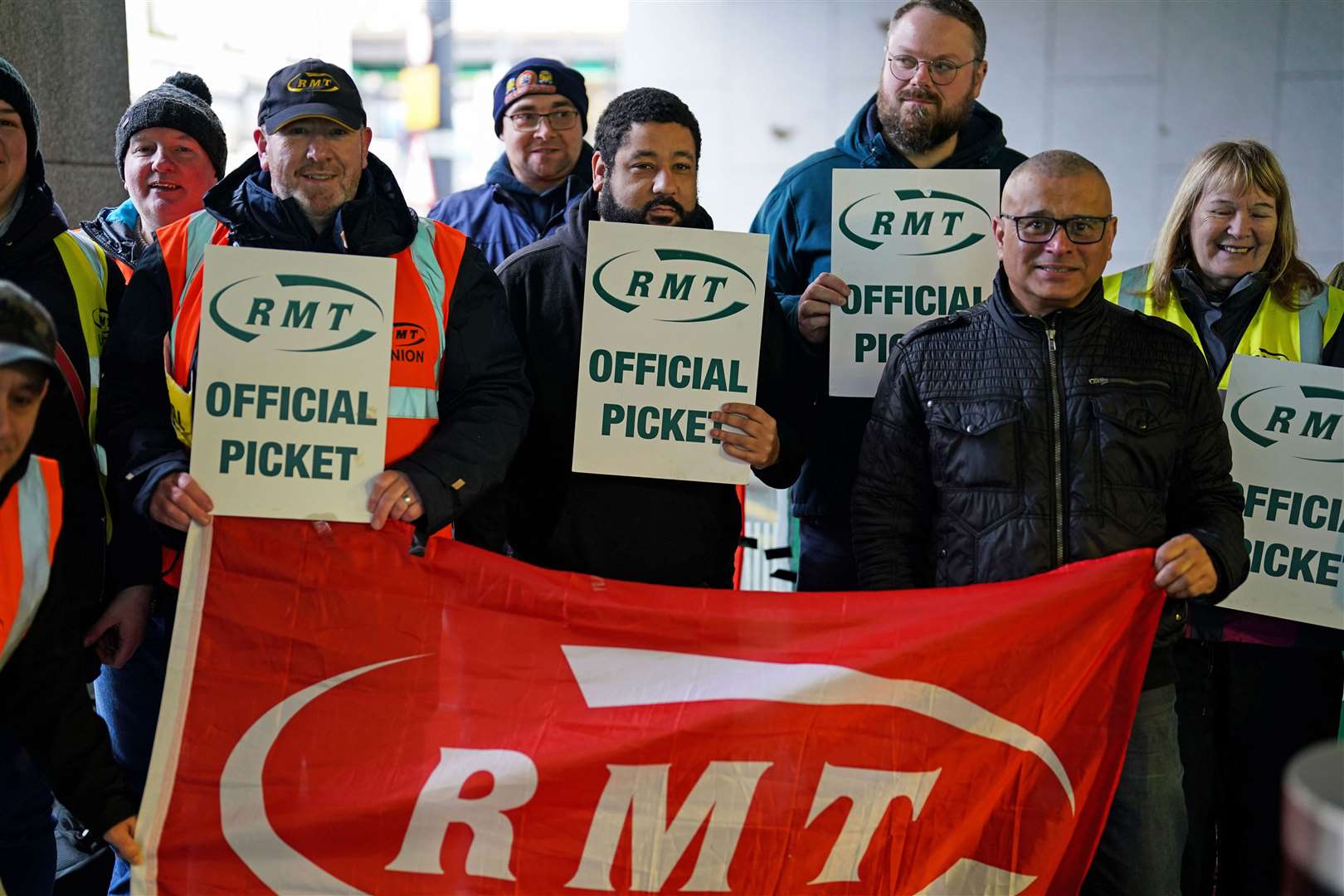RMT members on the picket line outside New Street station in Birmingham (Jacob King/PA)